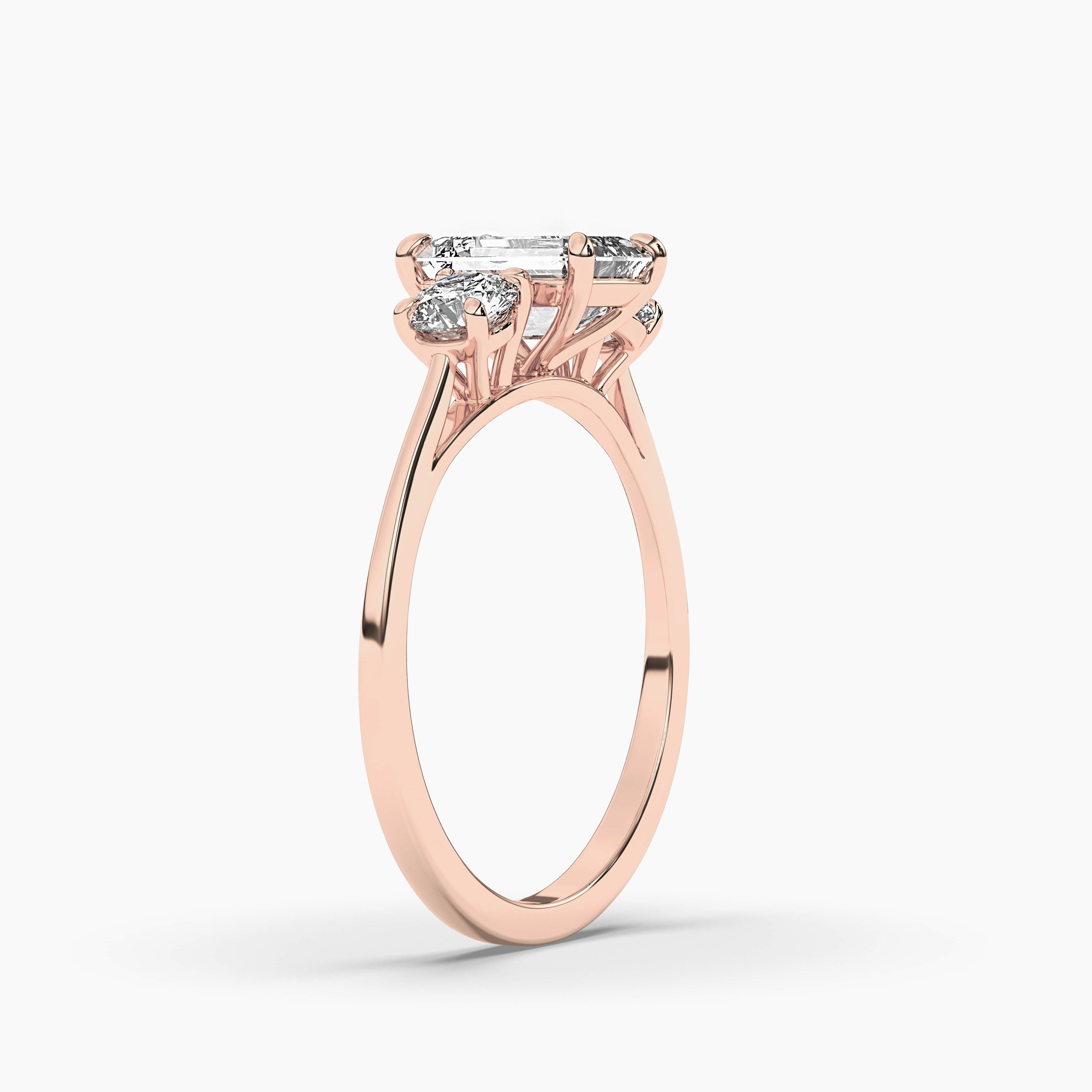Emerald cut emerald engagement ring rose gold
