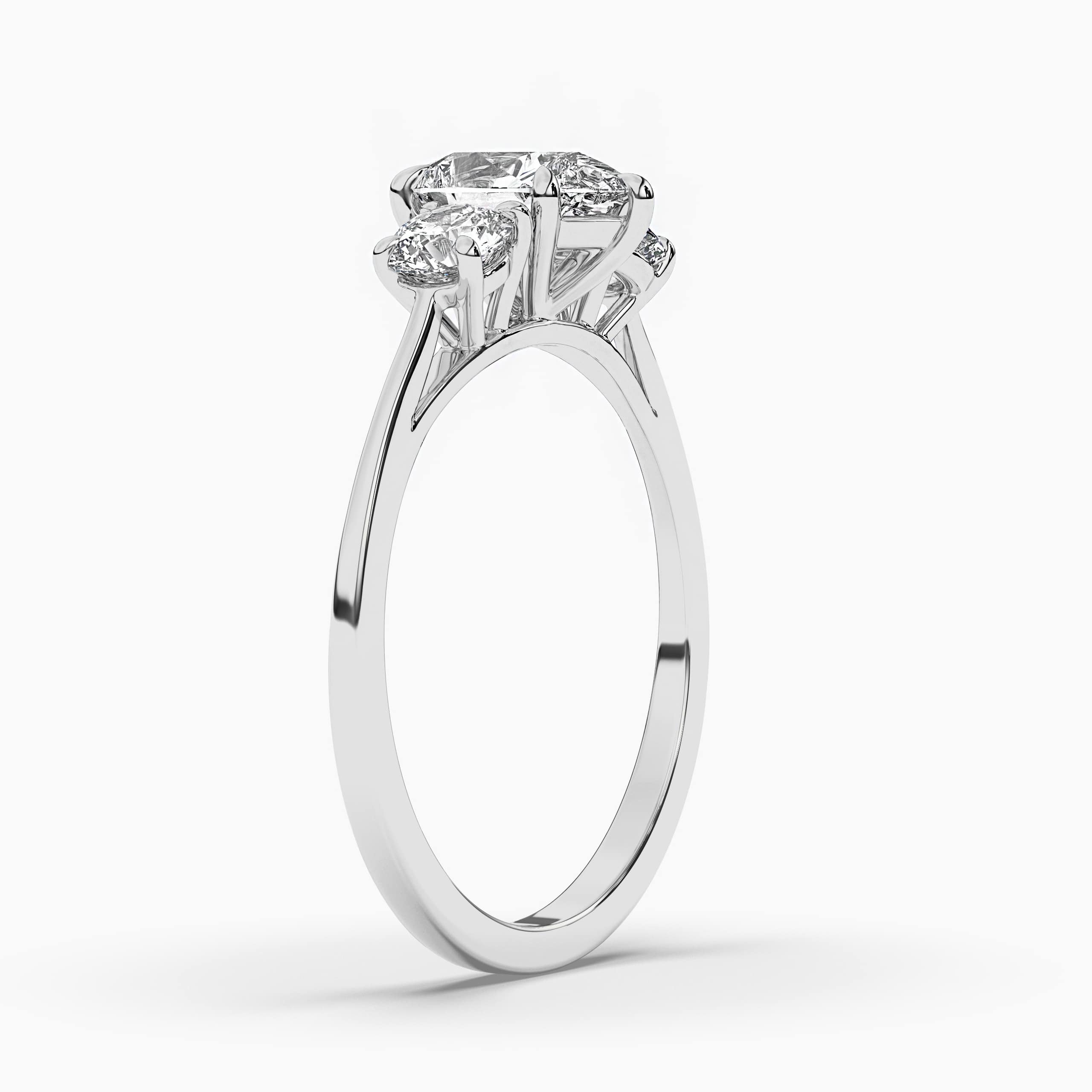 WHITE GOLD THREE STONE DIAMOND ENGAGEMENT RING WITH PEAR SHAPED SIDE STONES