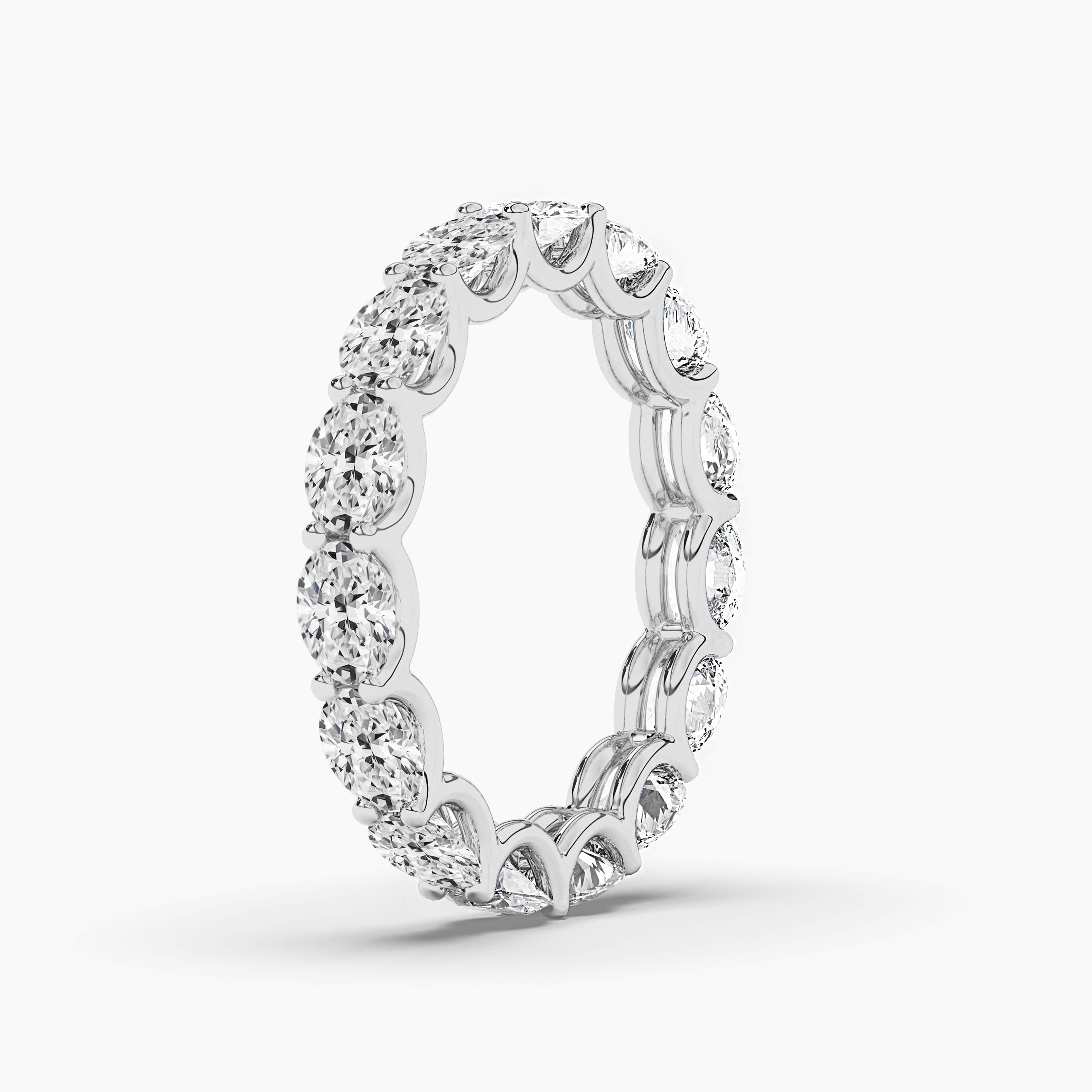 White Gold Oval Diamond Ring with Diamond Band