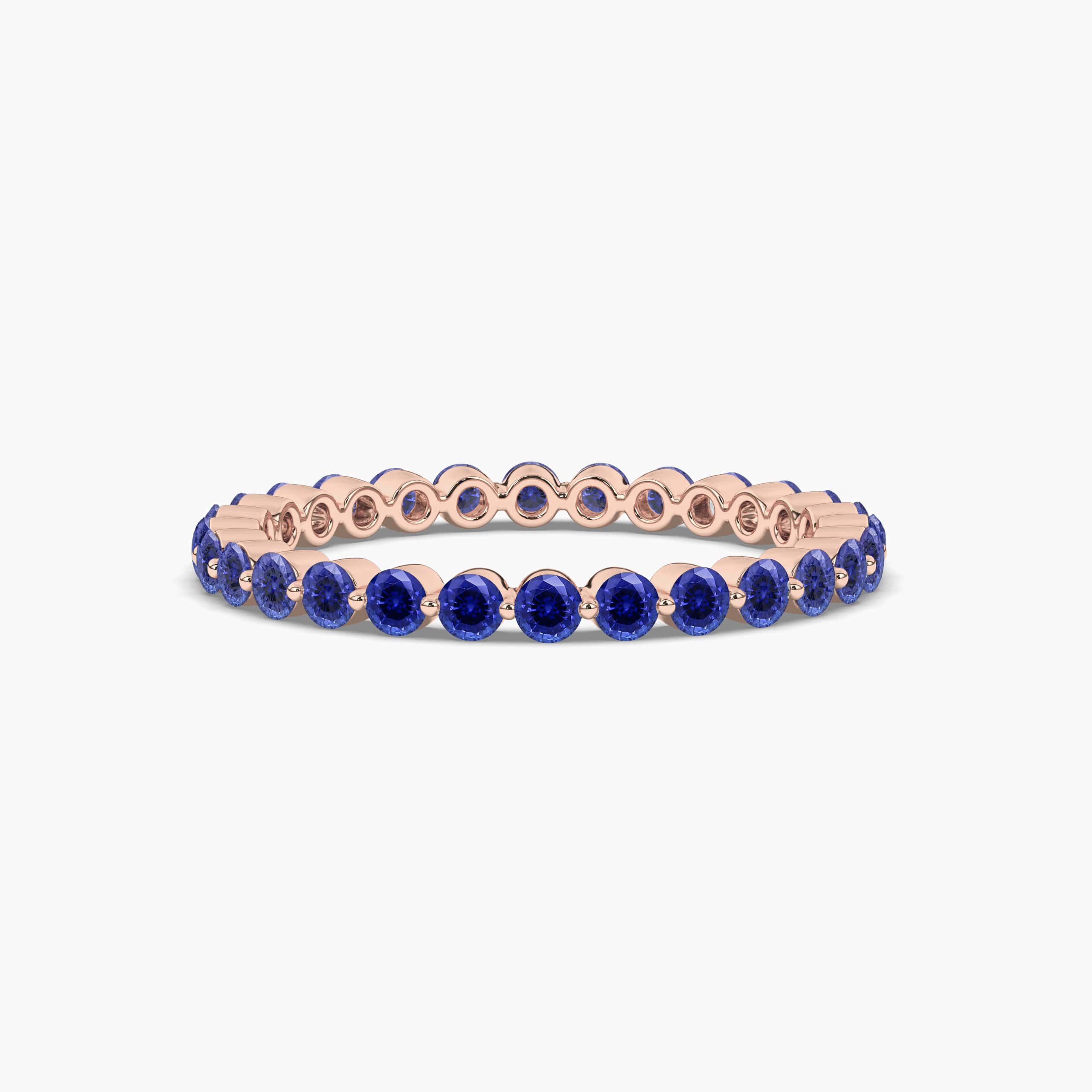 Rose Gold Blue Sapphire Eternity Wedding Band In Round Cut Band In Rose Gold For Woman