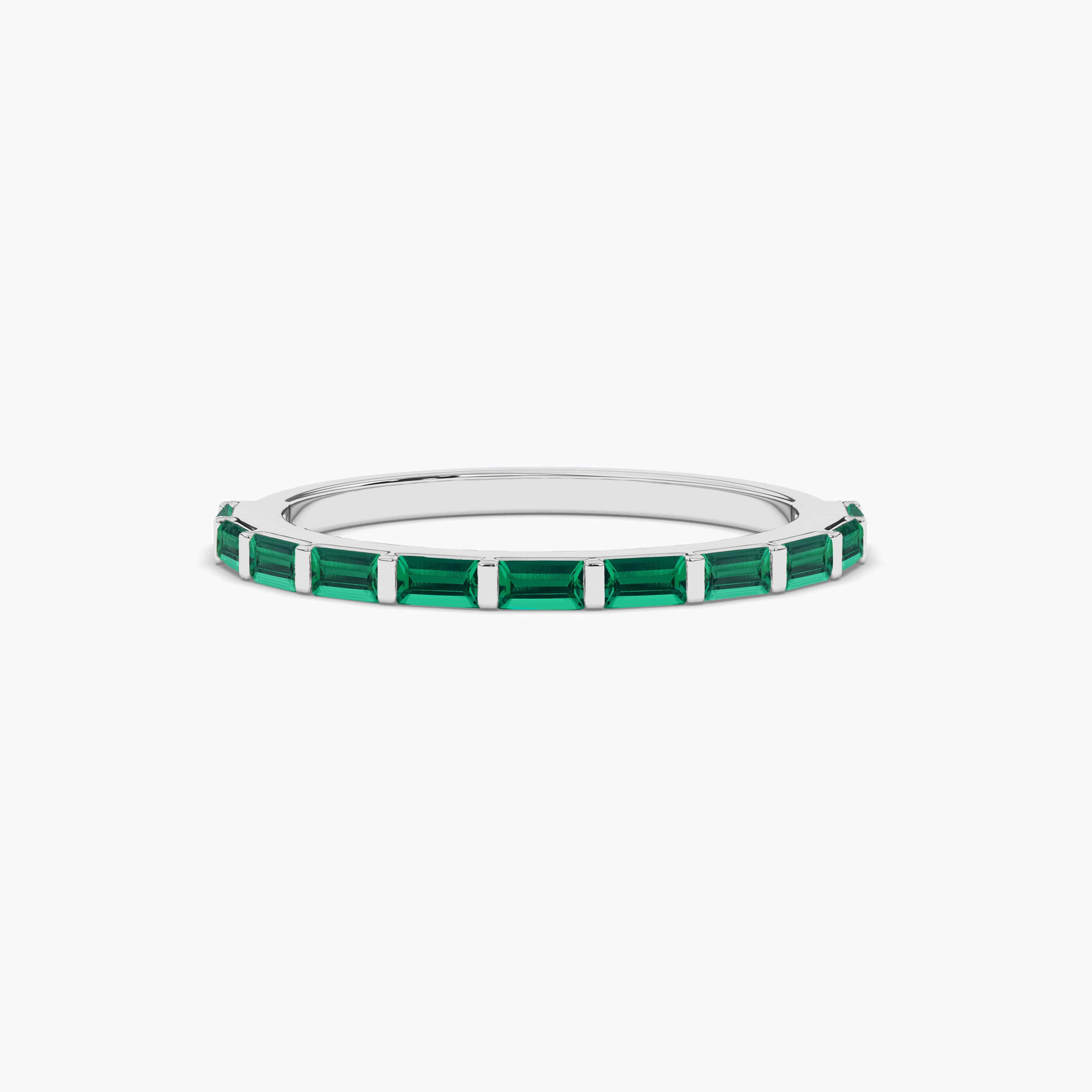 white gold emerald baguette half eternity band