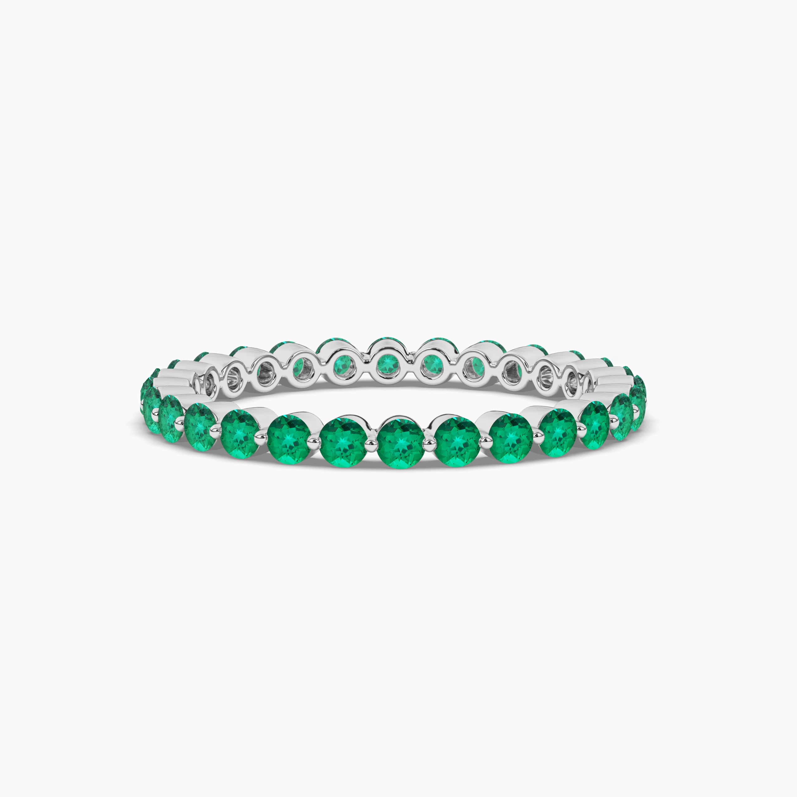 Green Emerald Cut Eternity Wedding Band  In Round Cut Ring For Woman In White Gold 