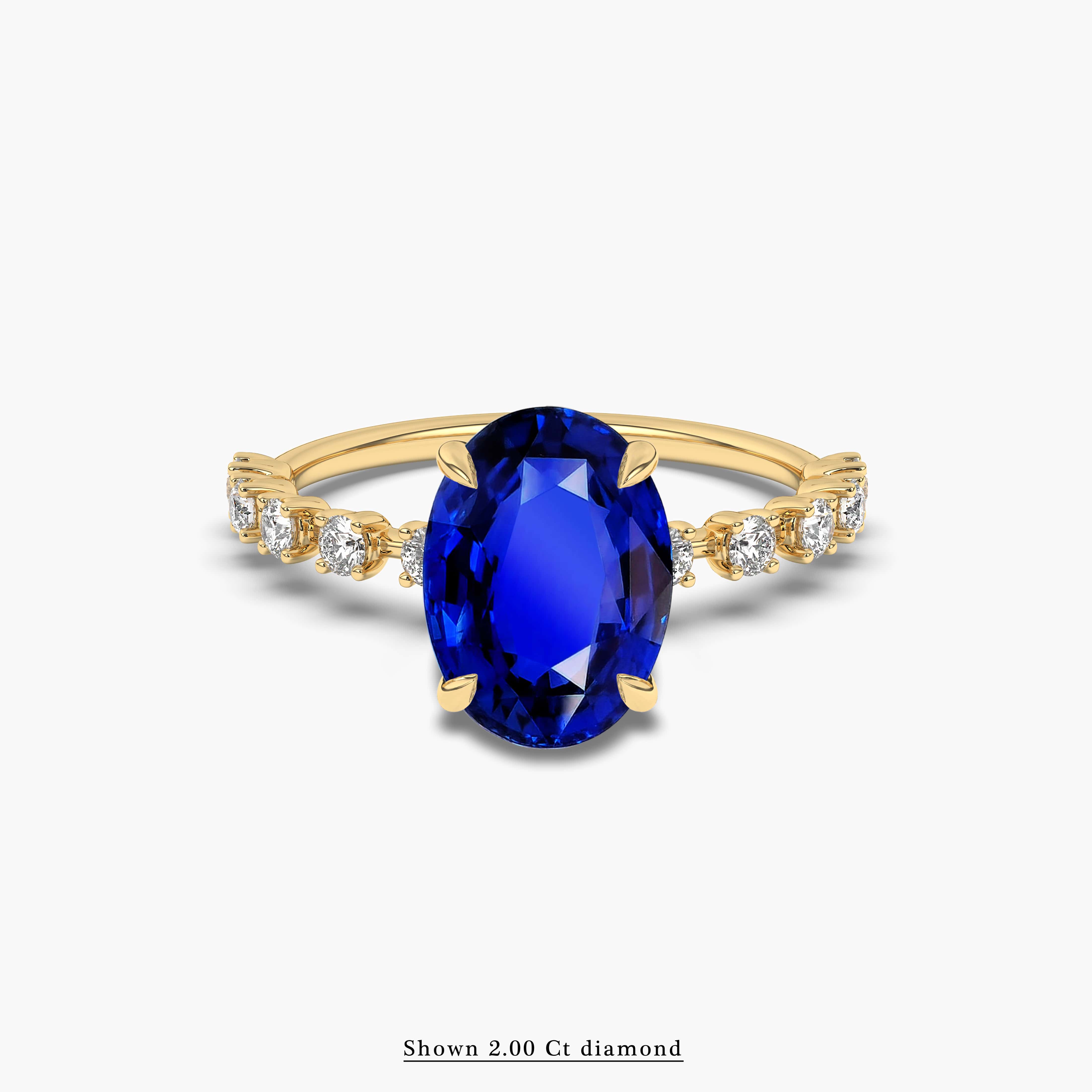 Oval Blue Sapphire and White Accent Diamonds in Yellow Gold