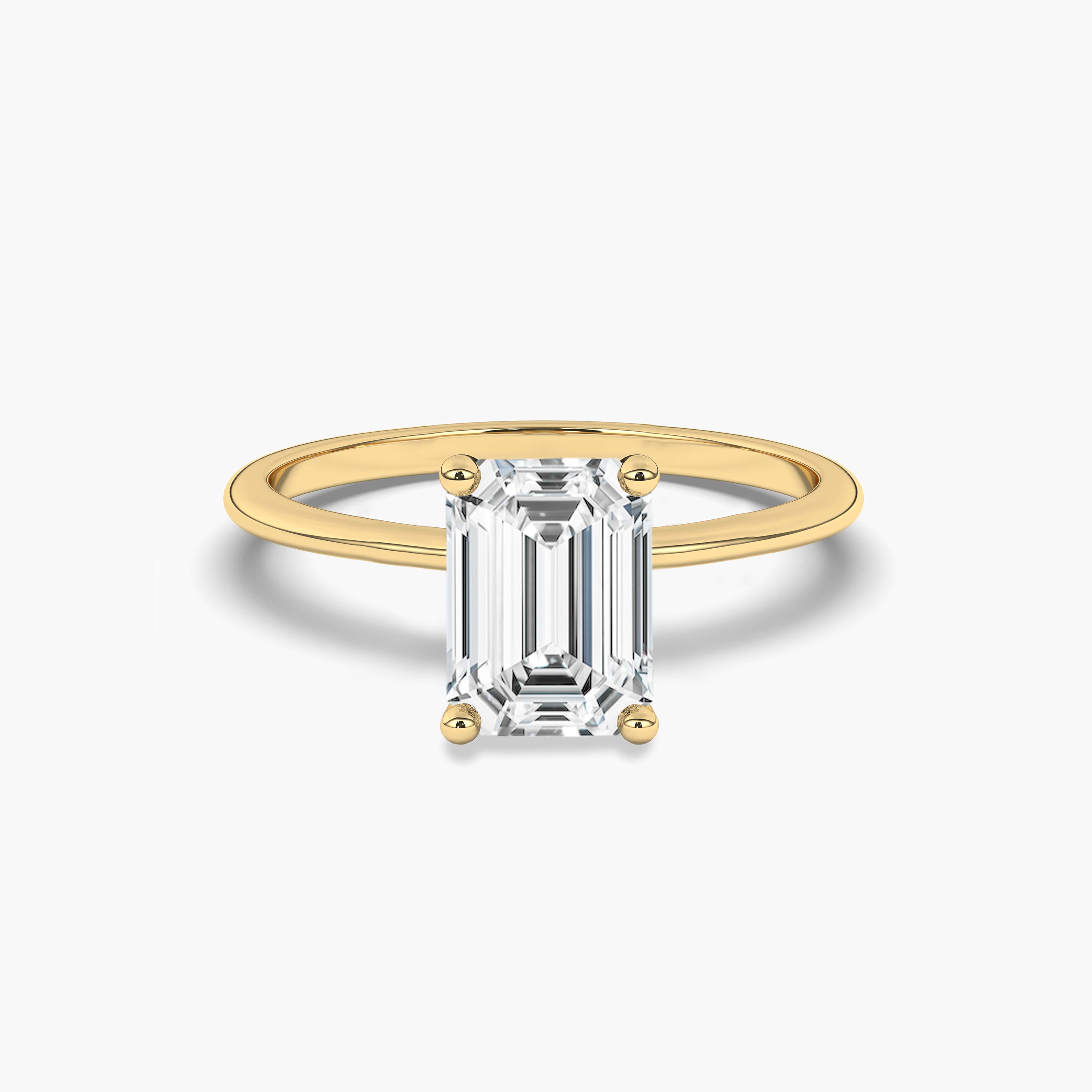 Emerald cut solitaire engagement rings