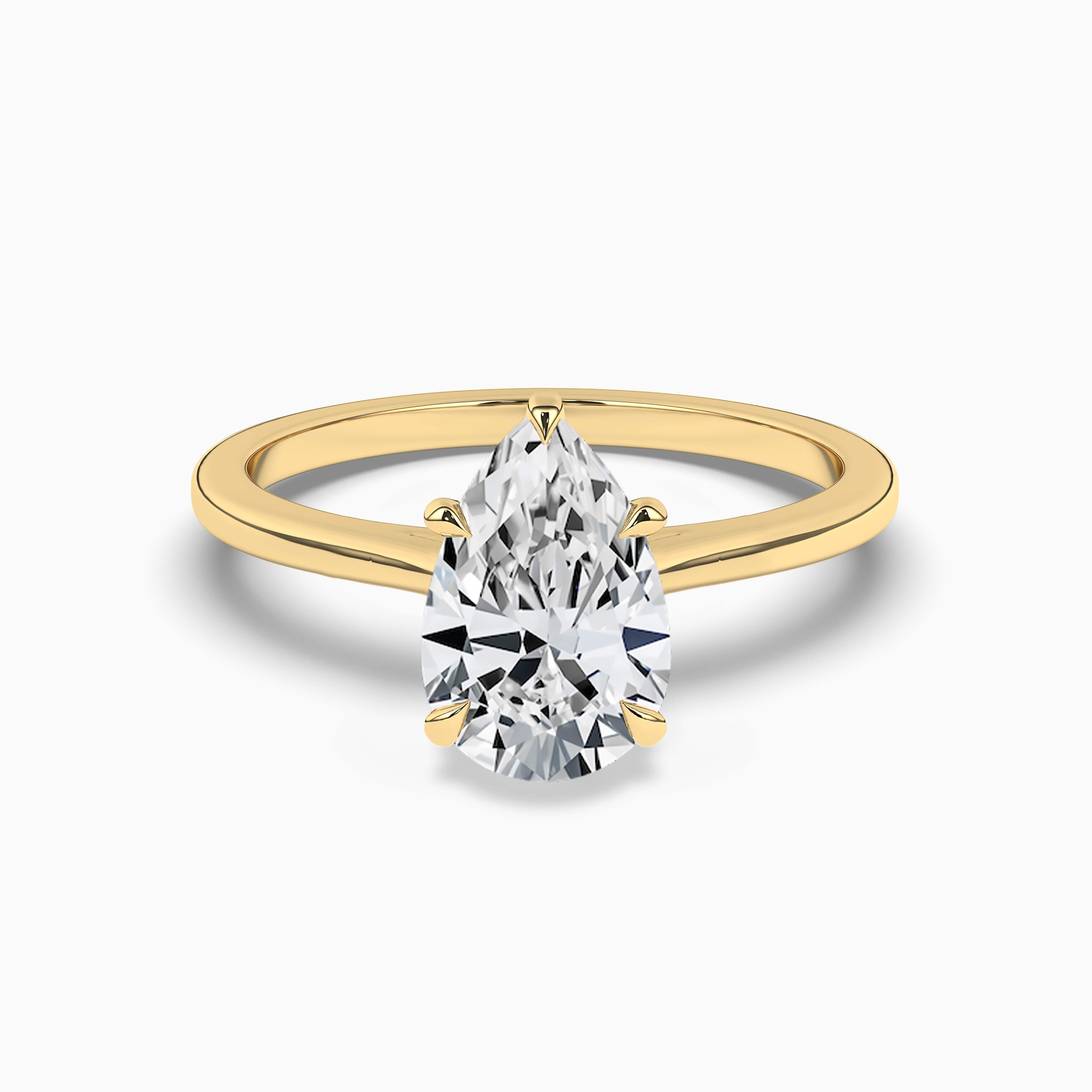 Pear shape diamond solitaire Yellow Gold