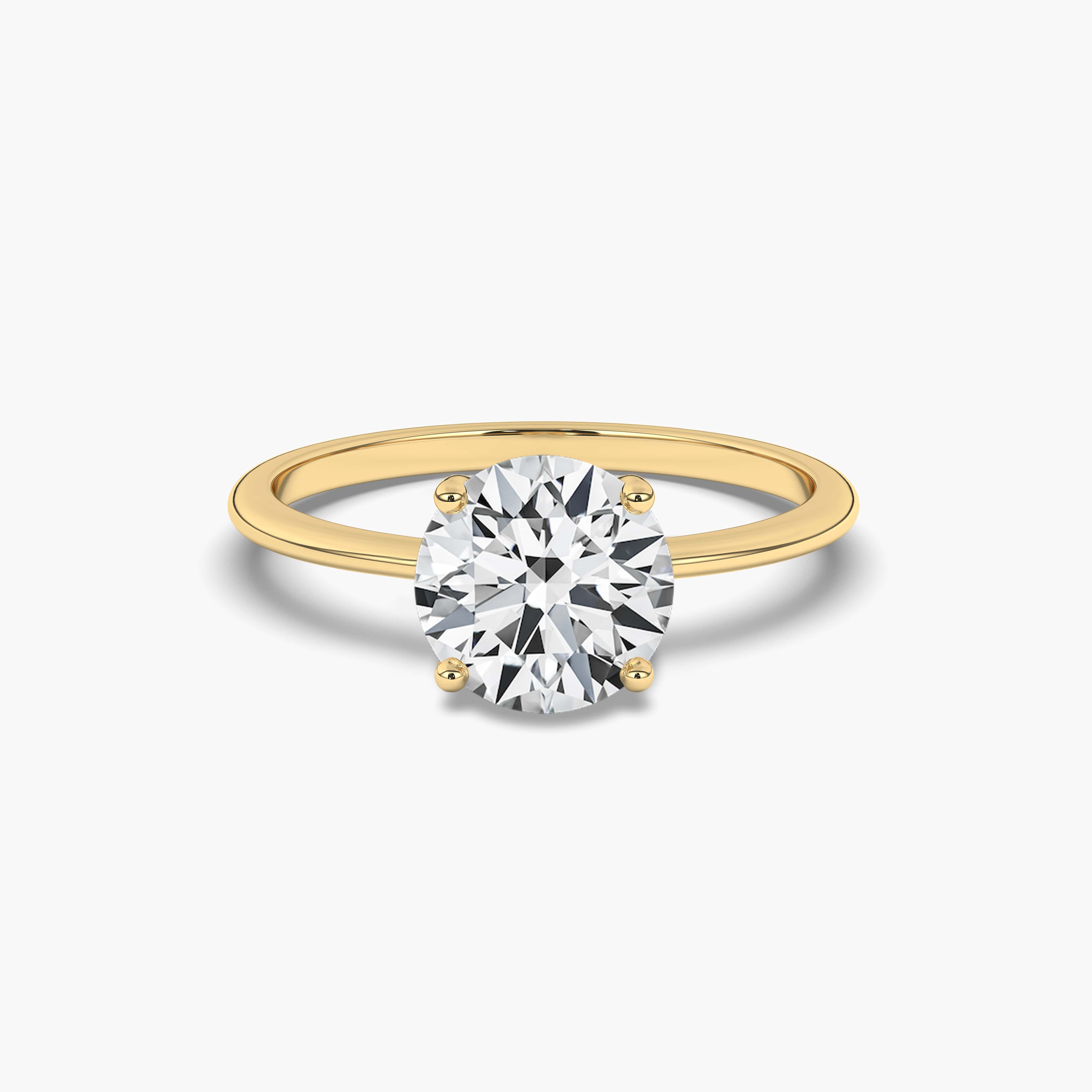 Round cut solitaire engagement rings
