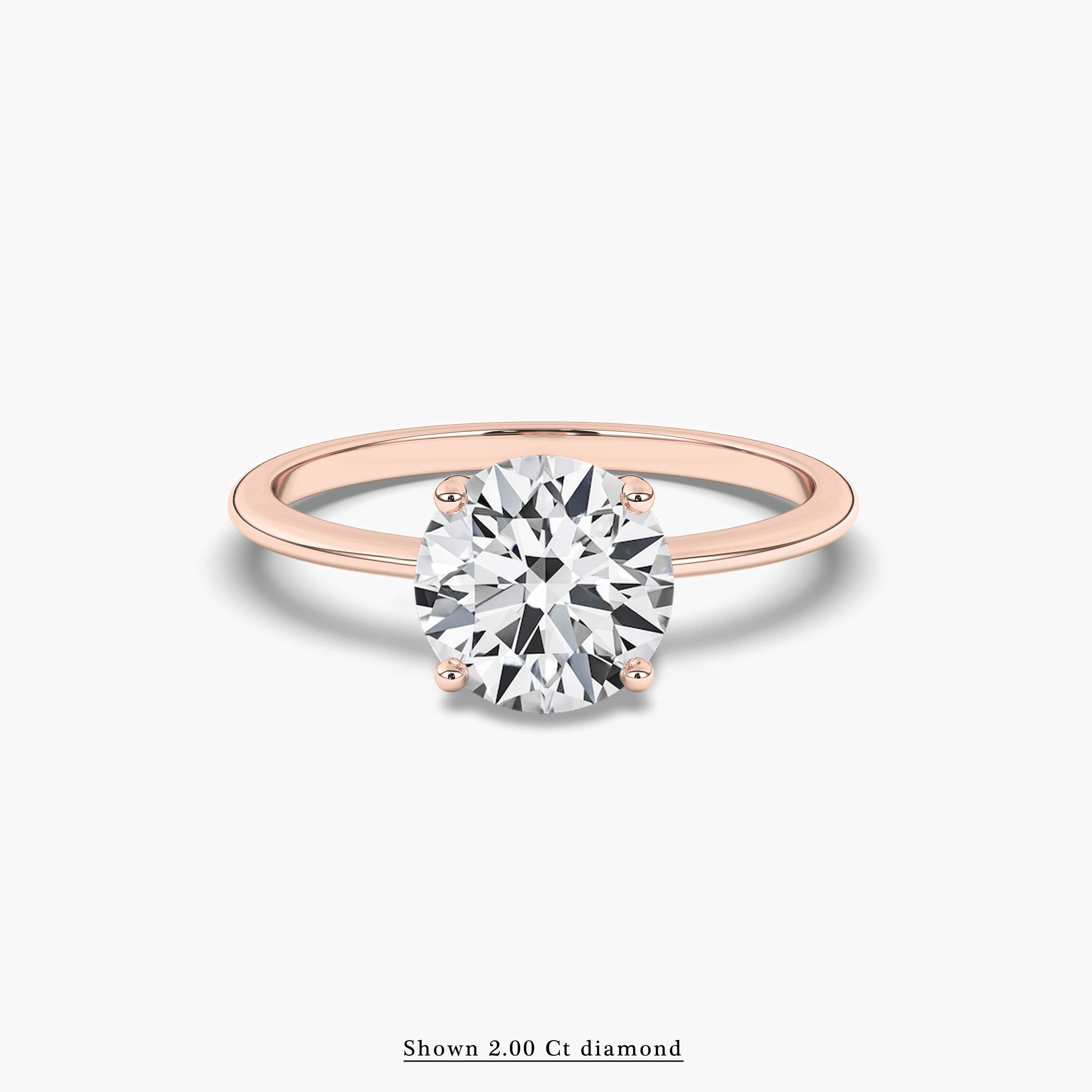 Brilliant Cut Diamond Solitaire Engagement Ring in Rose Gold