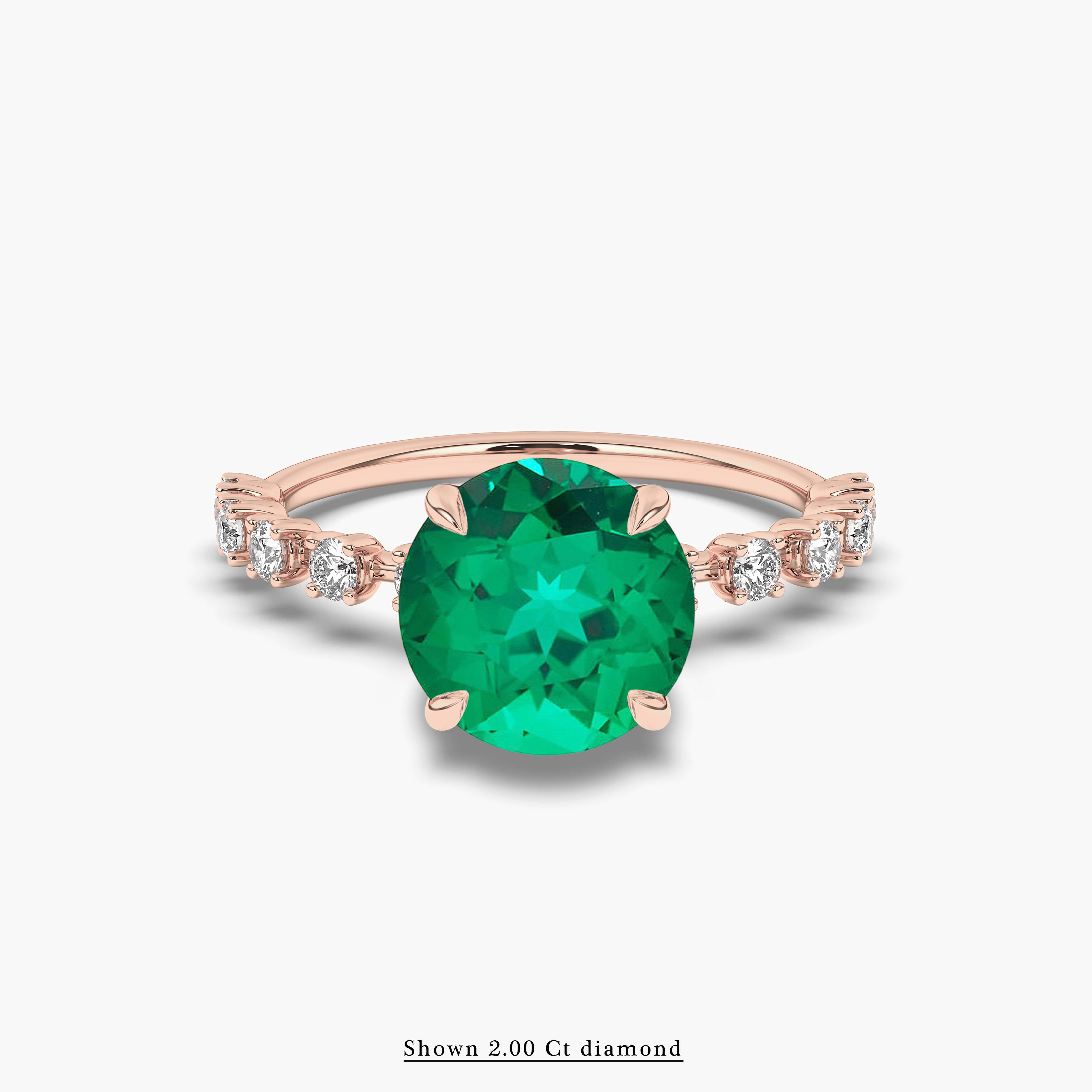 Emerald Gemstone round diamond side stone ring