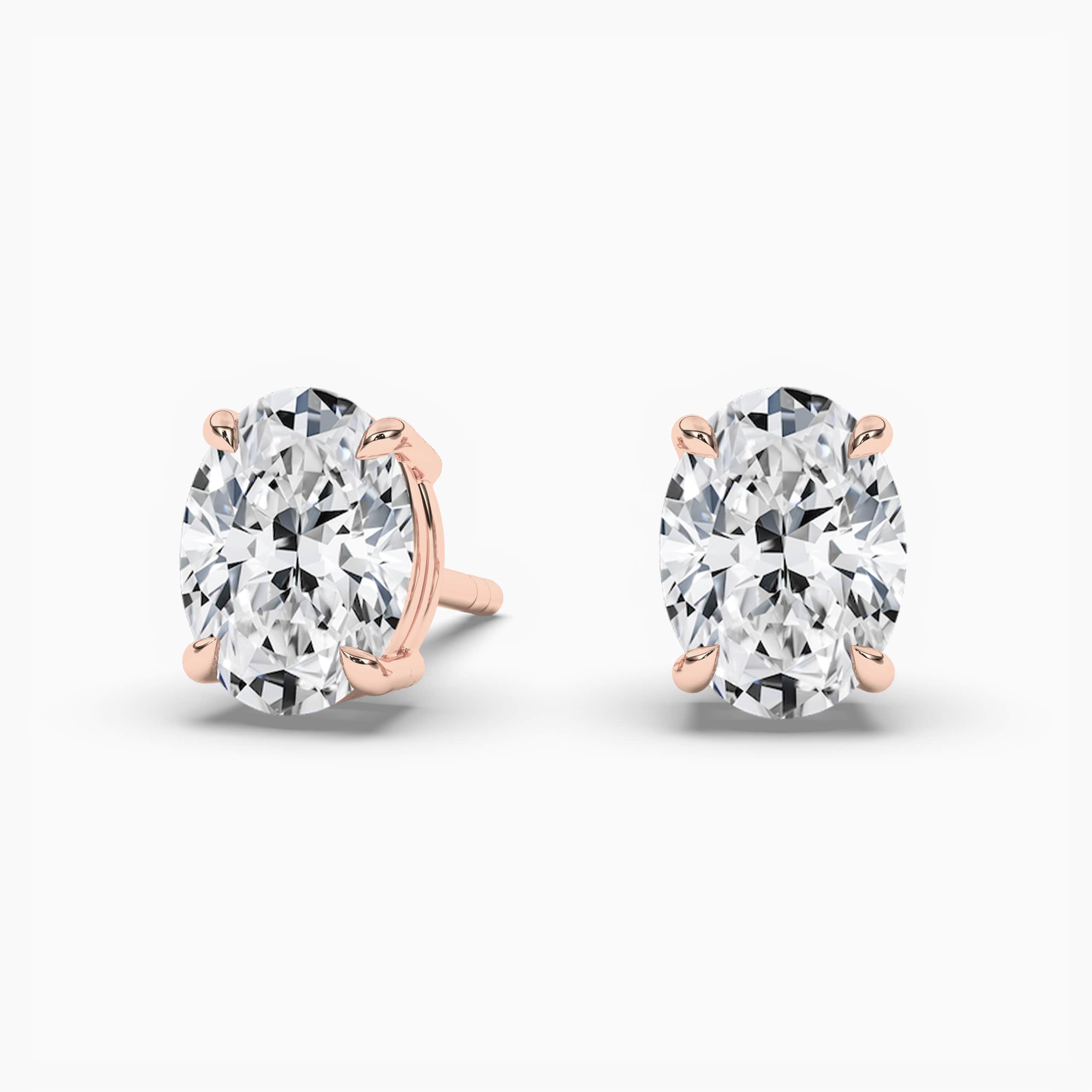 Oval Cut Moissanite Solitaire Stud Earrings In Rose Gold