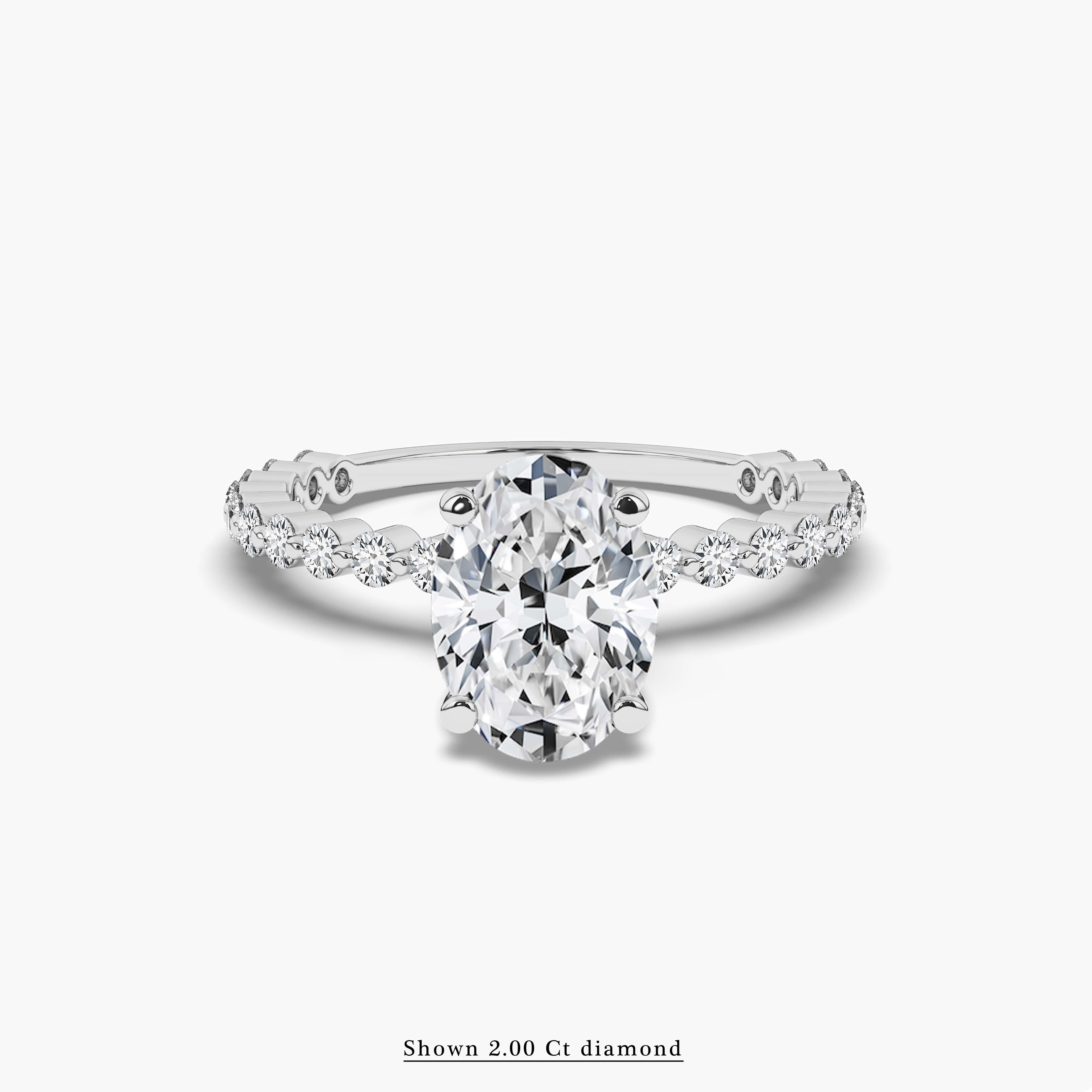 White gold oval cut diamond engagement ring 