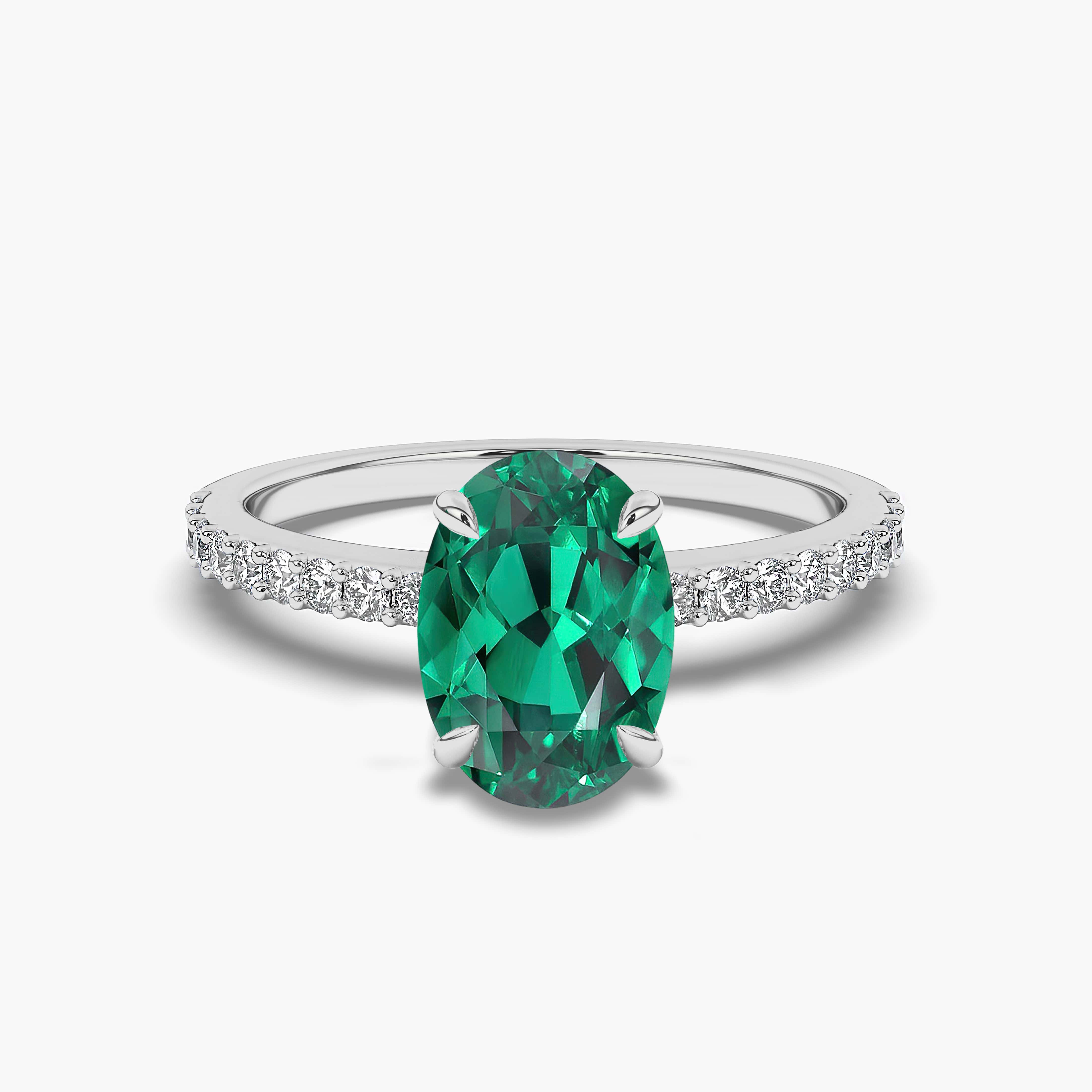 Oval Cut Lab Emerald With Engagement Ring In White Gold