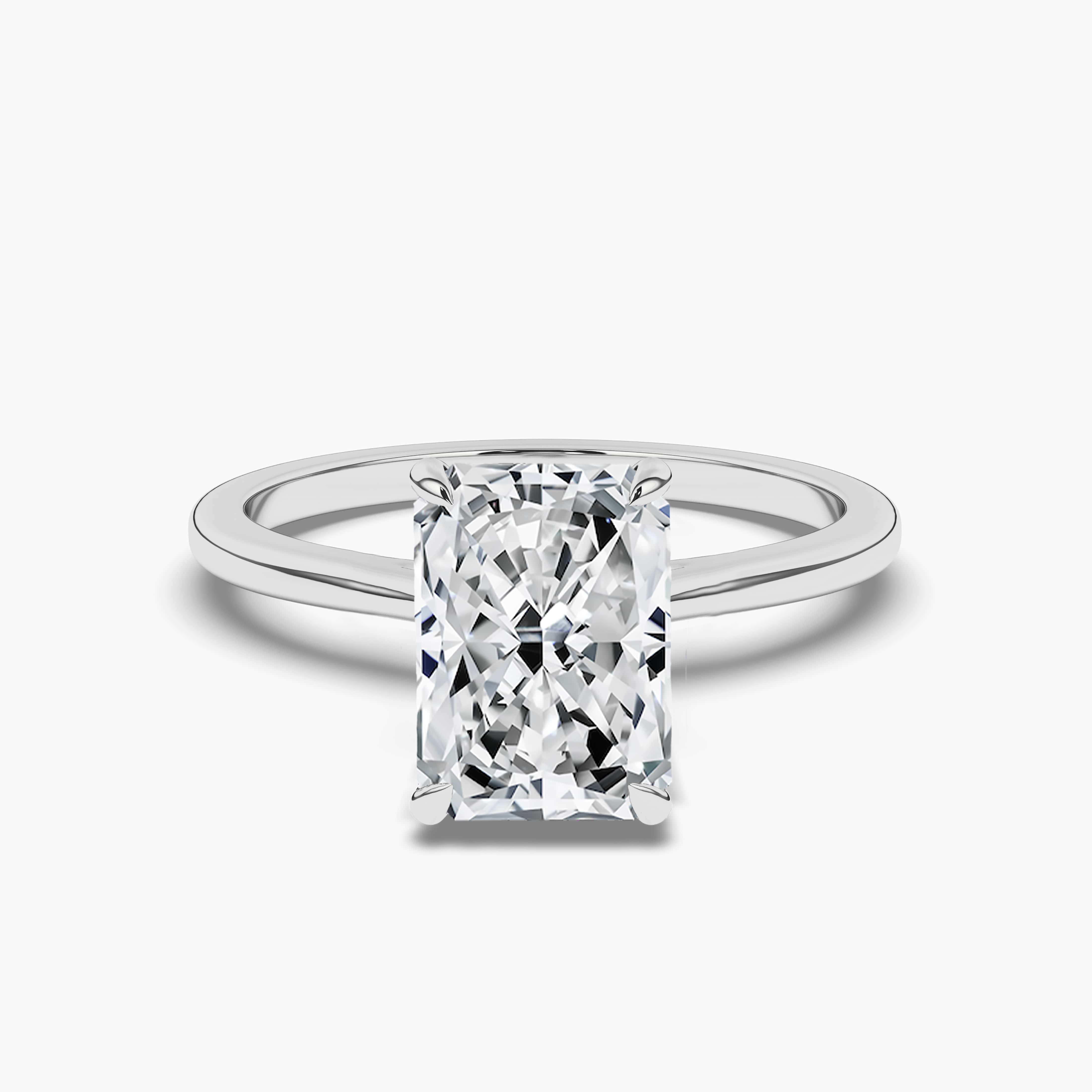 Radiant diamond solitaire engagement ring set in white gold