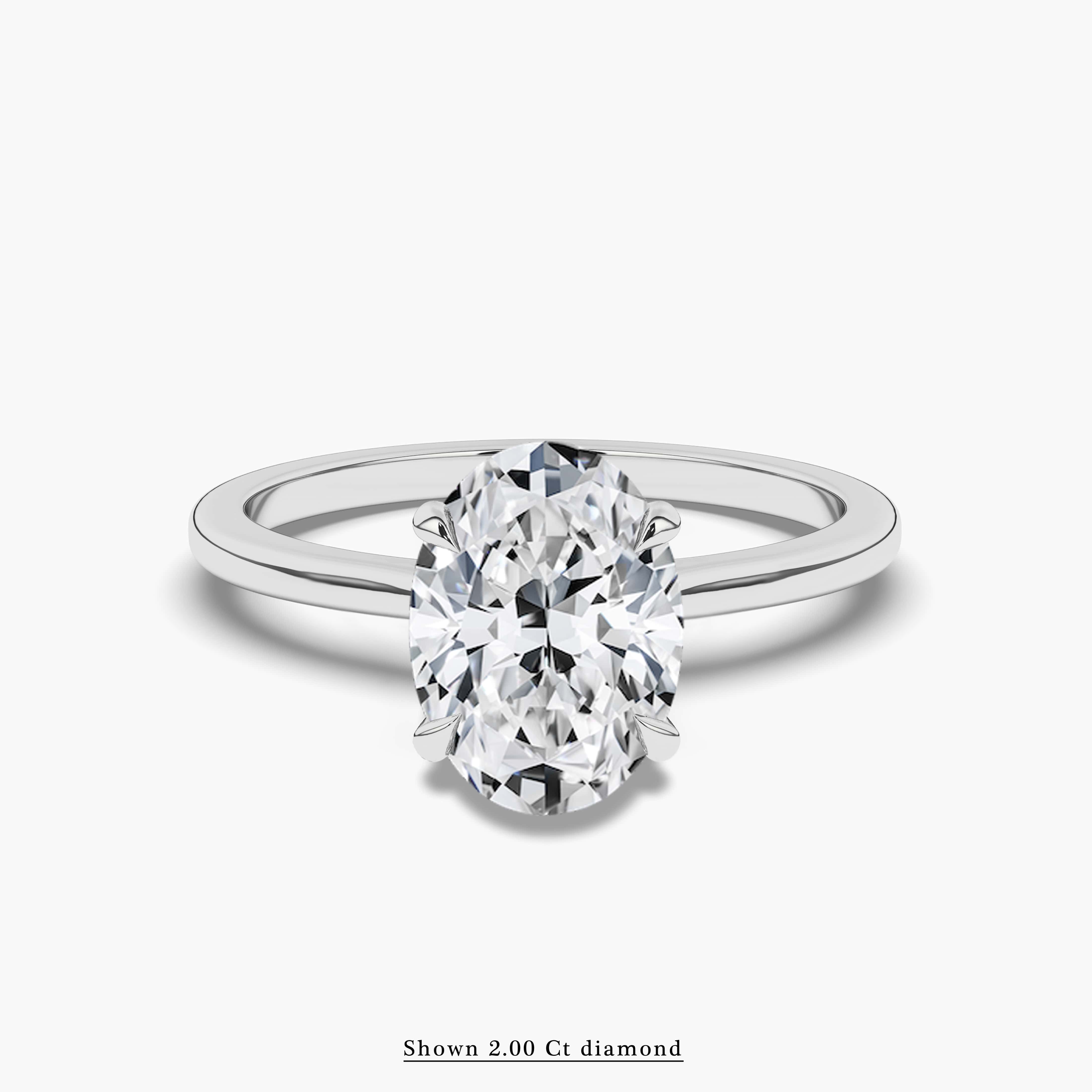 Oval Solitaire Cathedral Setting Engagement Ring