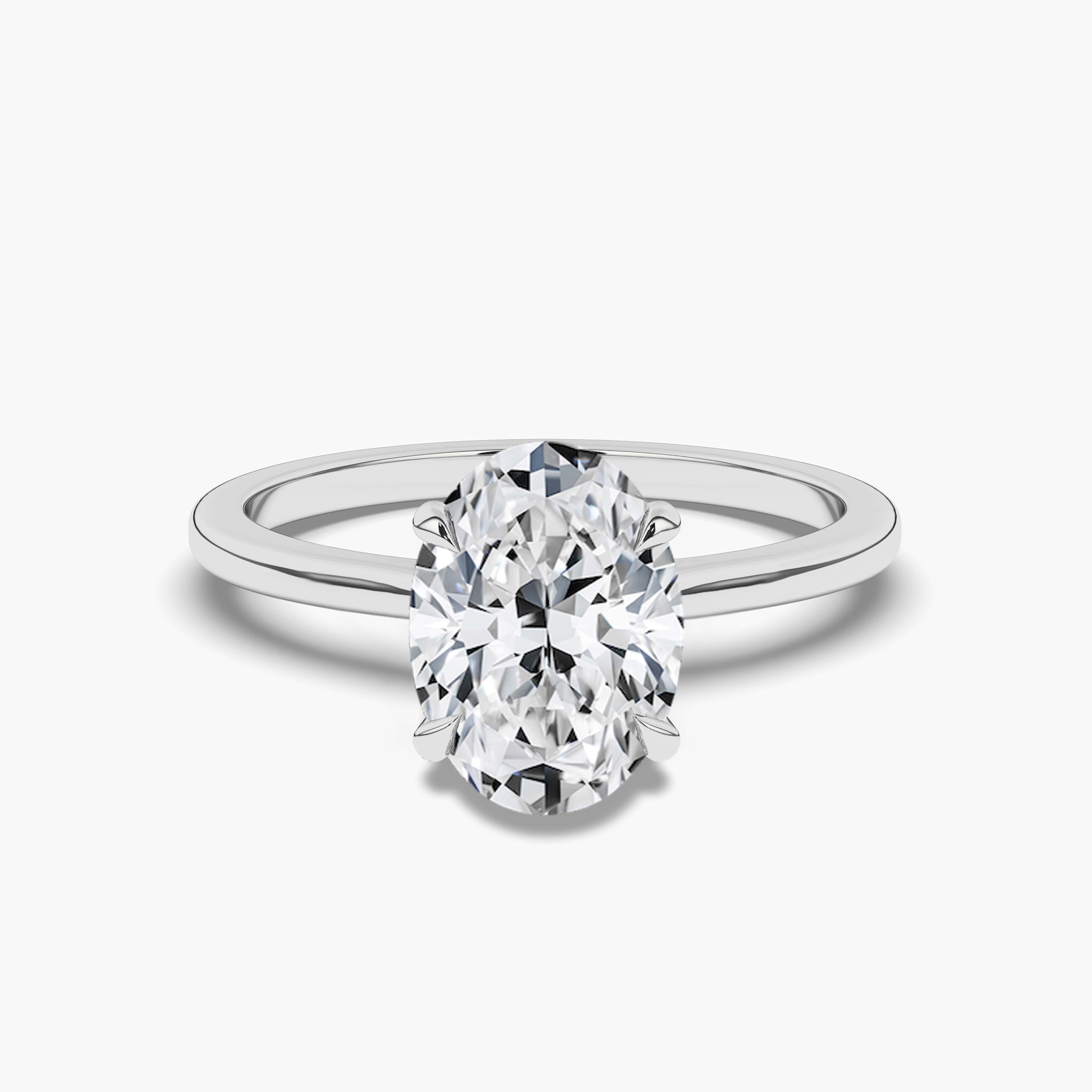 OVAL CUT DIAMOND ENGAGEMENT RING IN WHITE GOLD