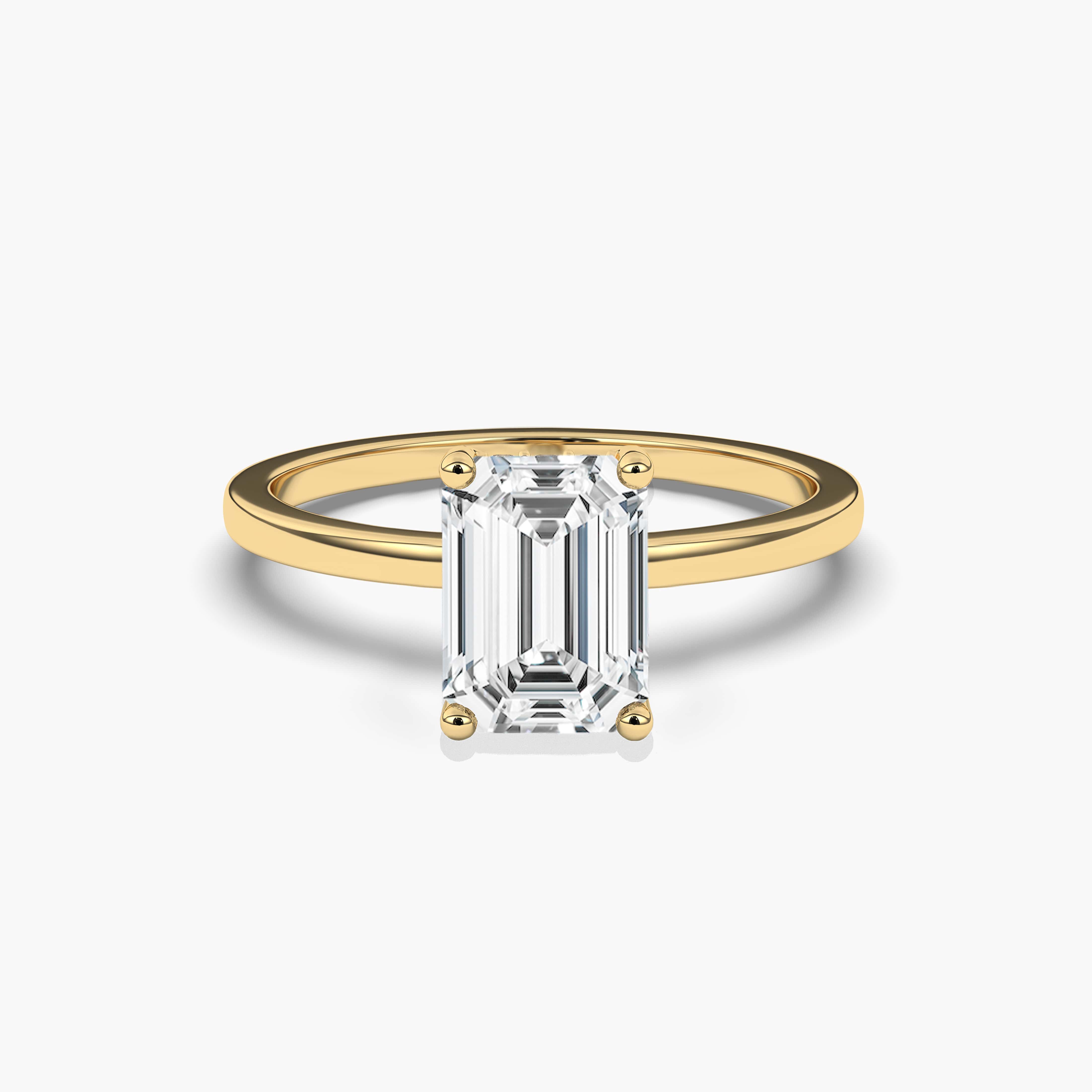 hidden halo emerald cut engagement ring