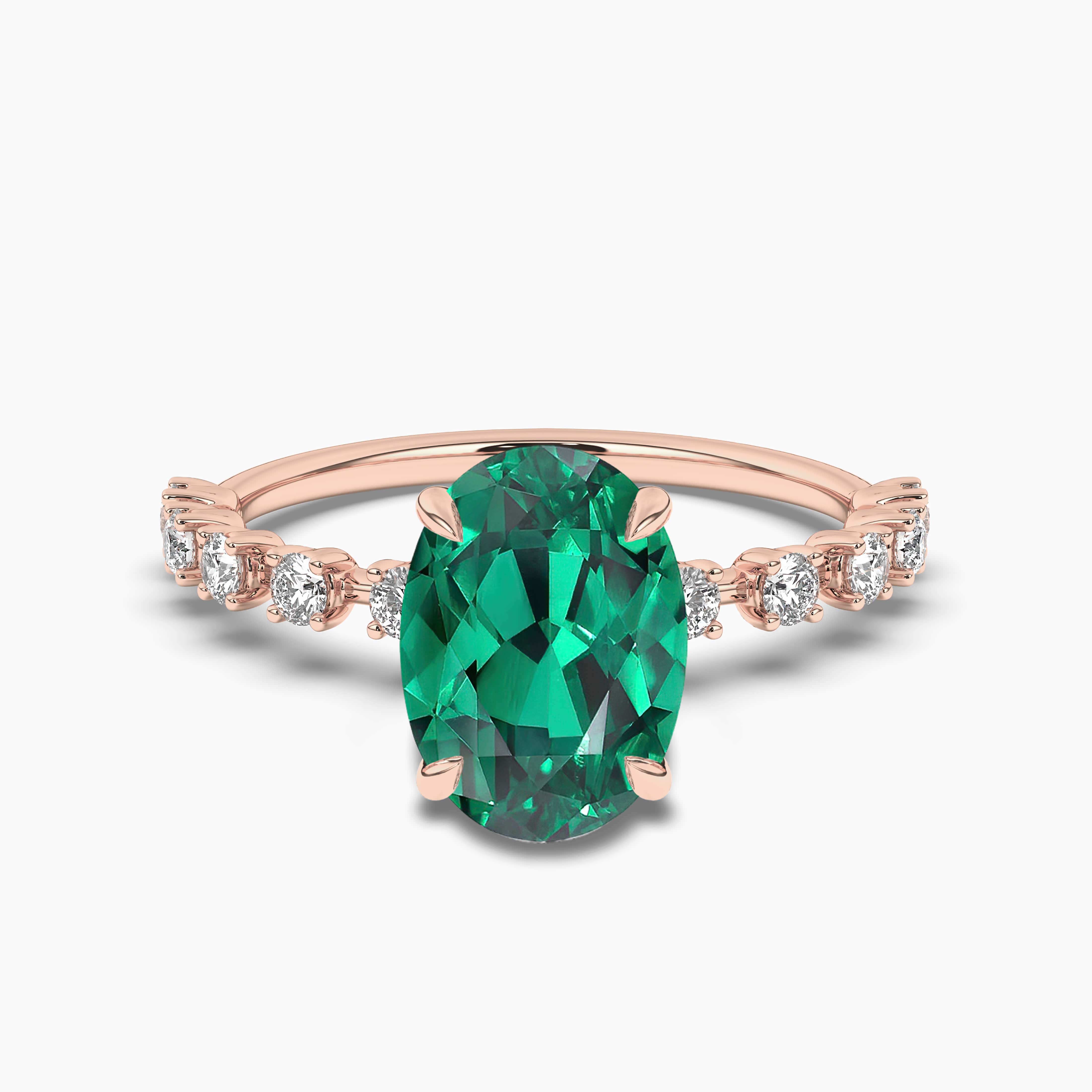 RING WITH EMERALD AND BRILLIANTS IN ROSE GOLD