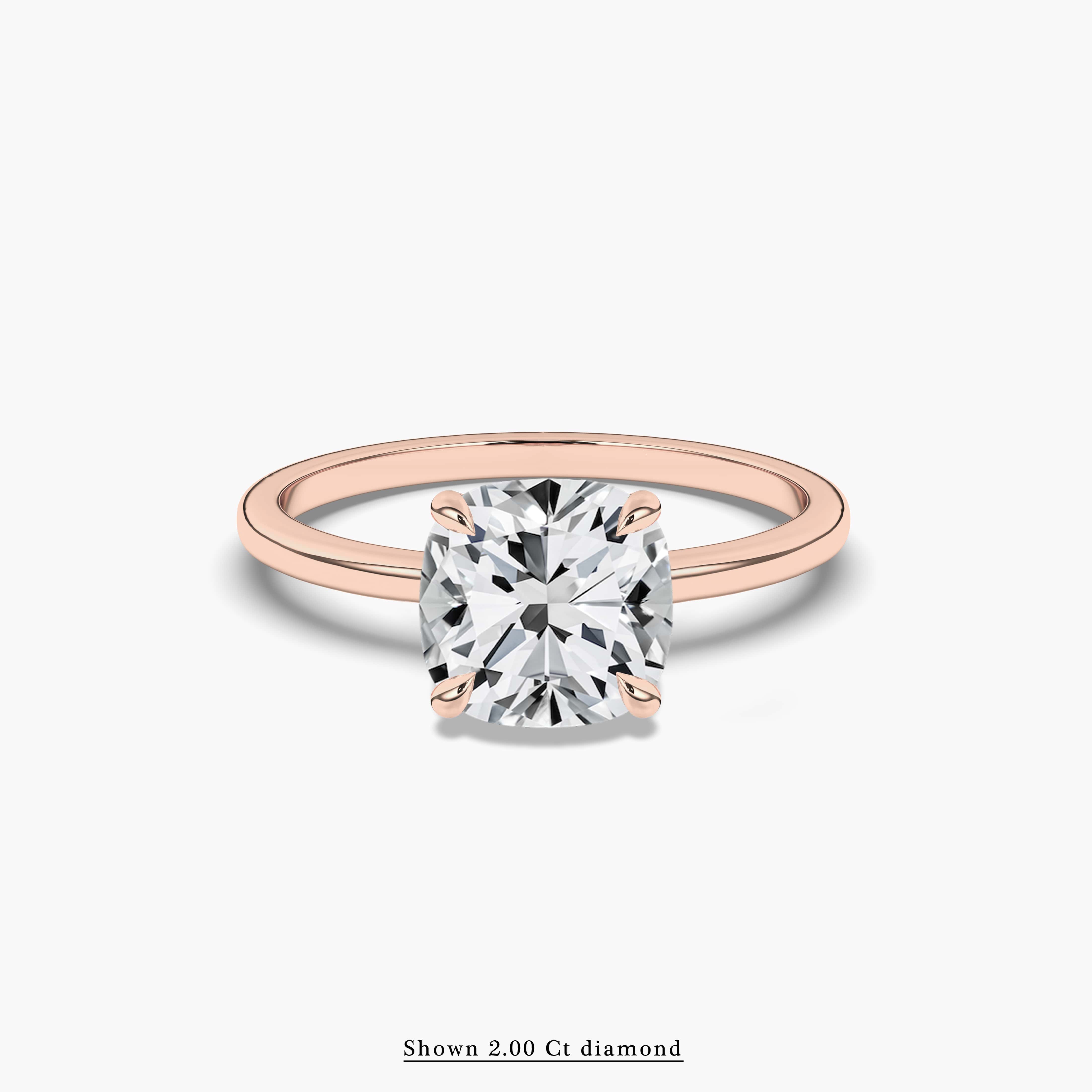 Rose gold hidden halo engagement ring.