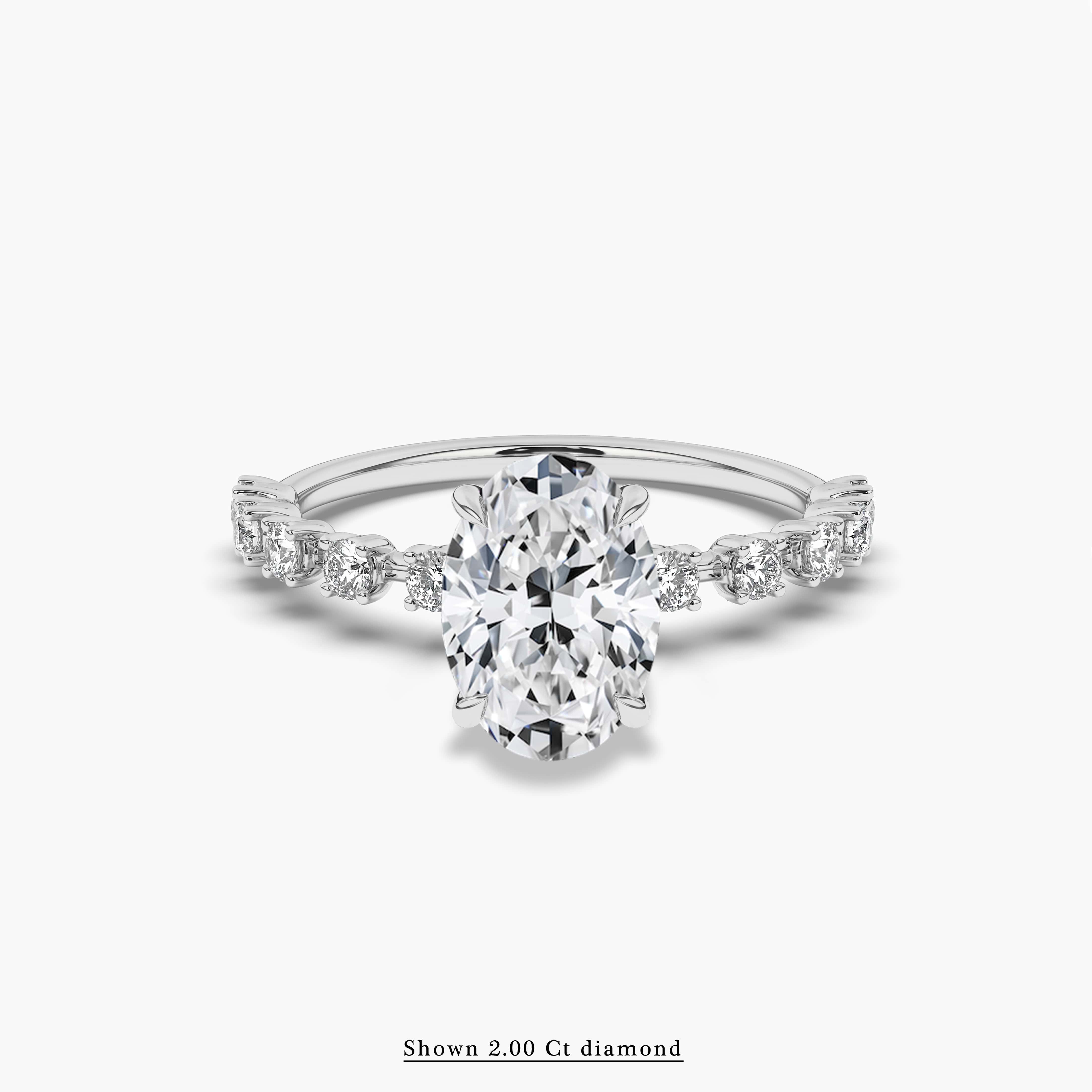 Oval Cut Solitaire Engagement Ring With Side Stones