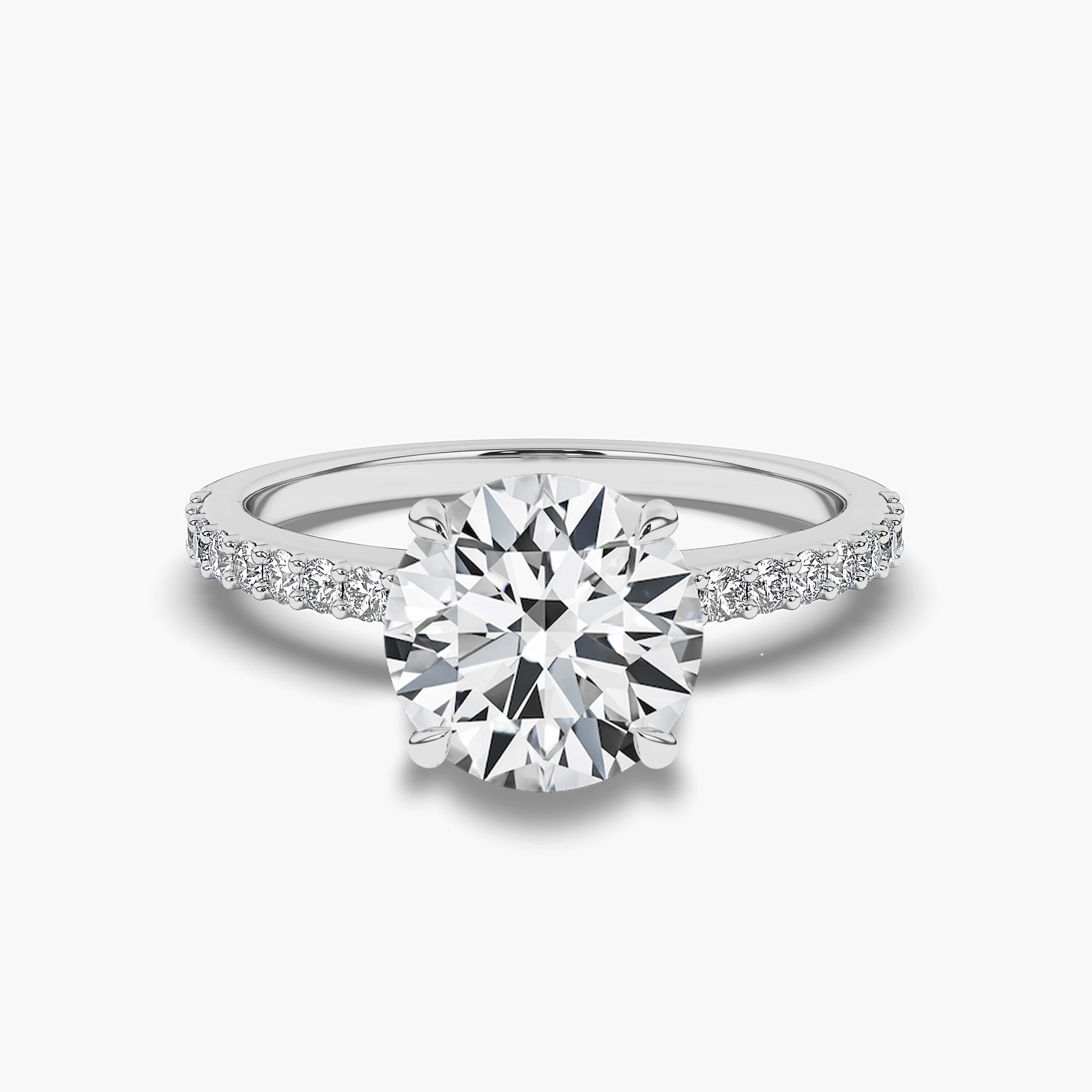 Round Cut Diamond Engagement Ring with Side Stones in White Gold