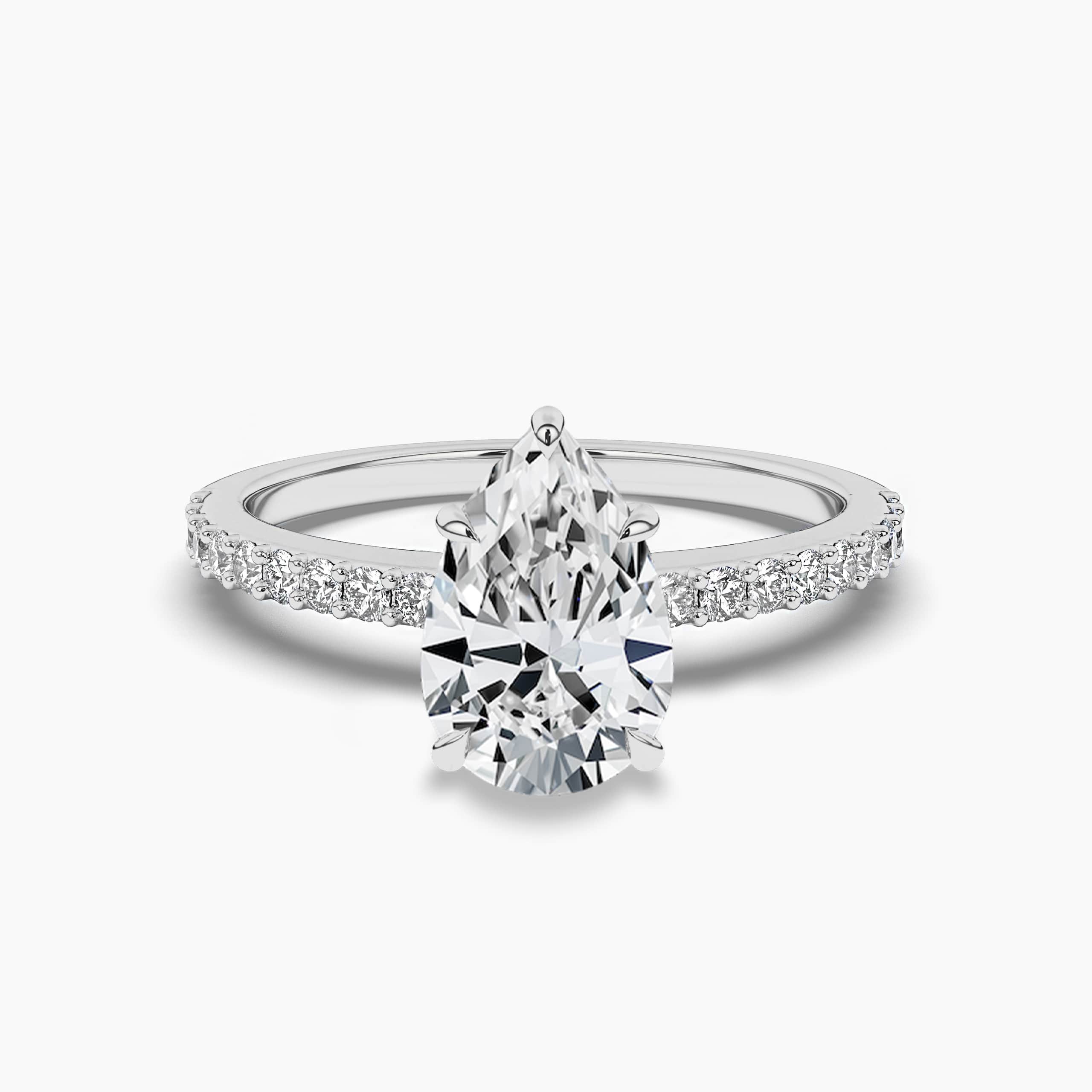 Pear Shaped Solitaire with Side Accents Engagement Ring in White gold