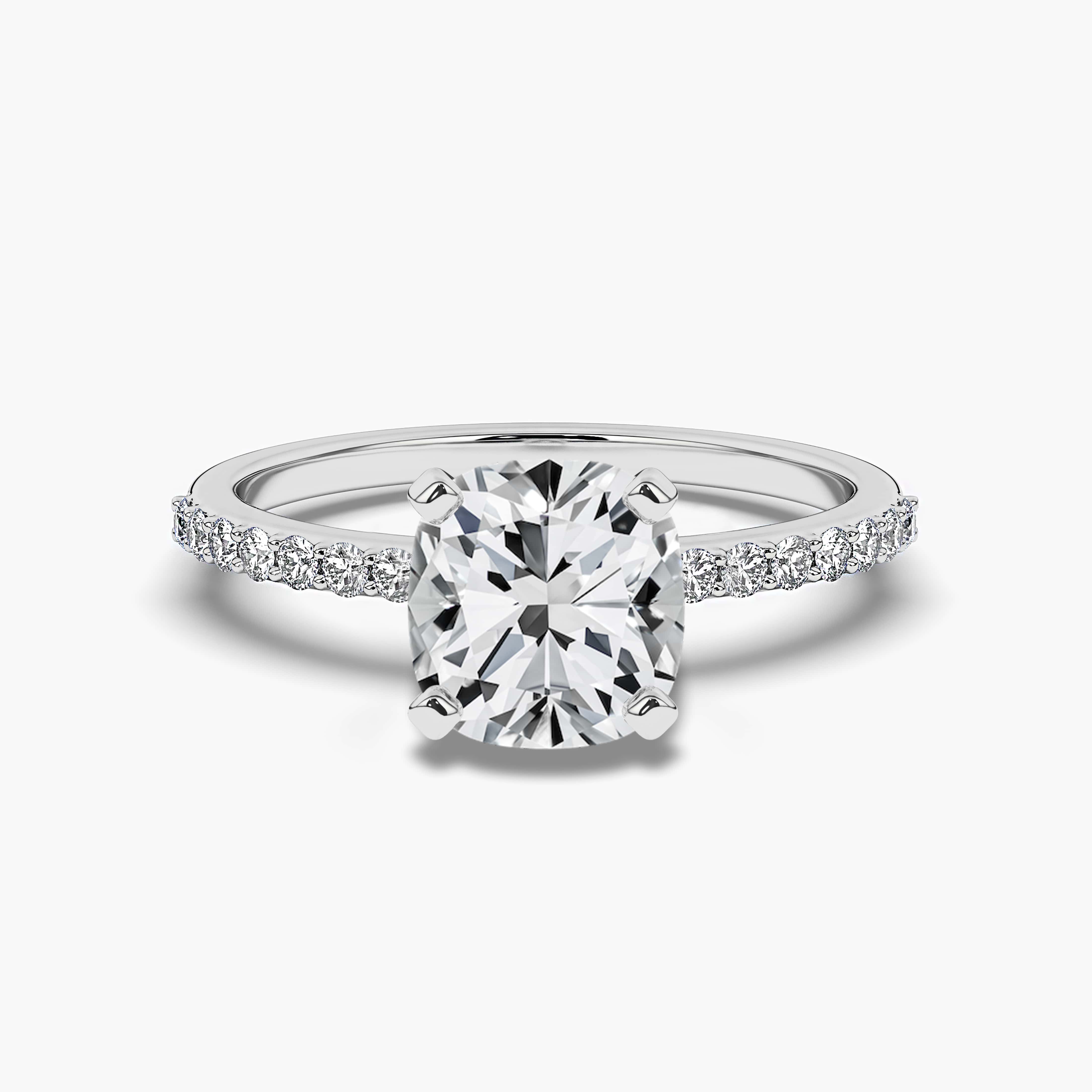 Side Stone Engagement Ring With Round Side Stones and Elongated Cushion Cut 
