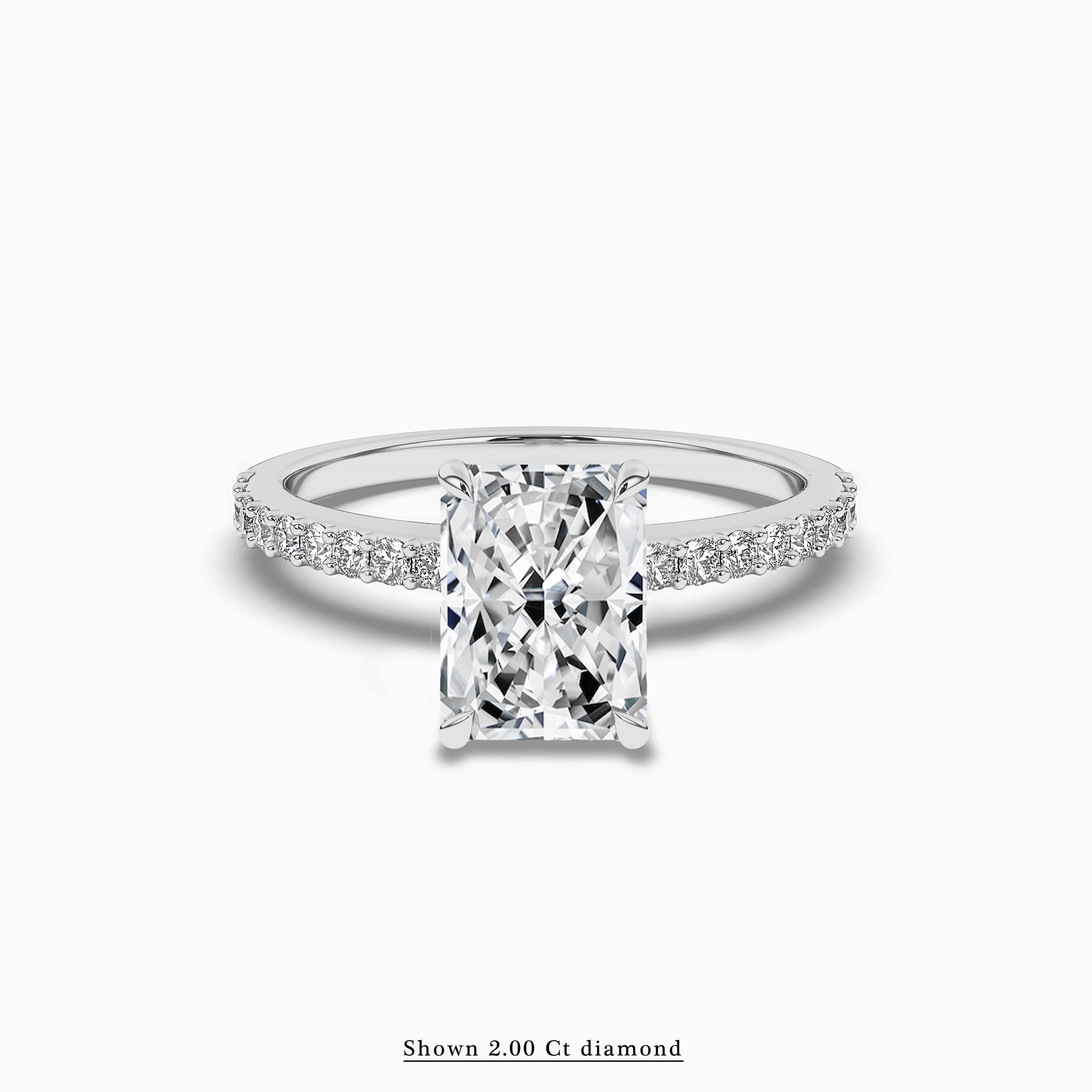 White gold engagement ring on finger