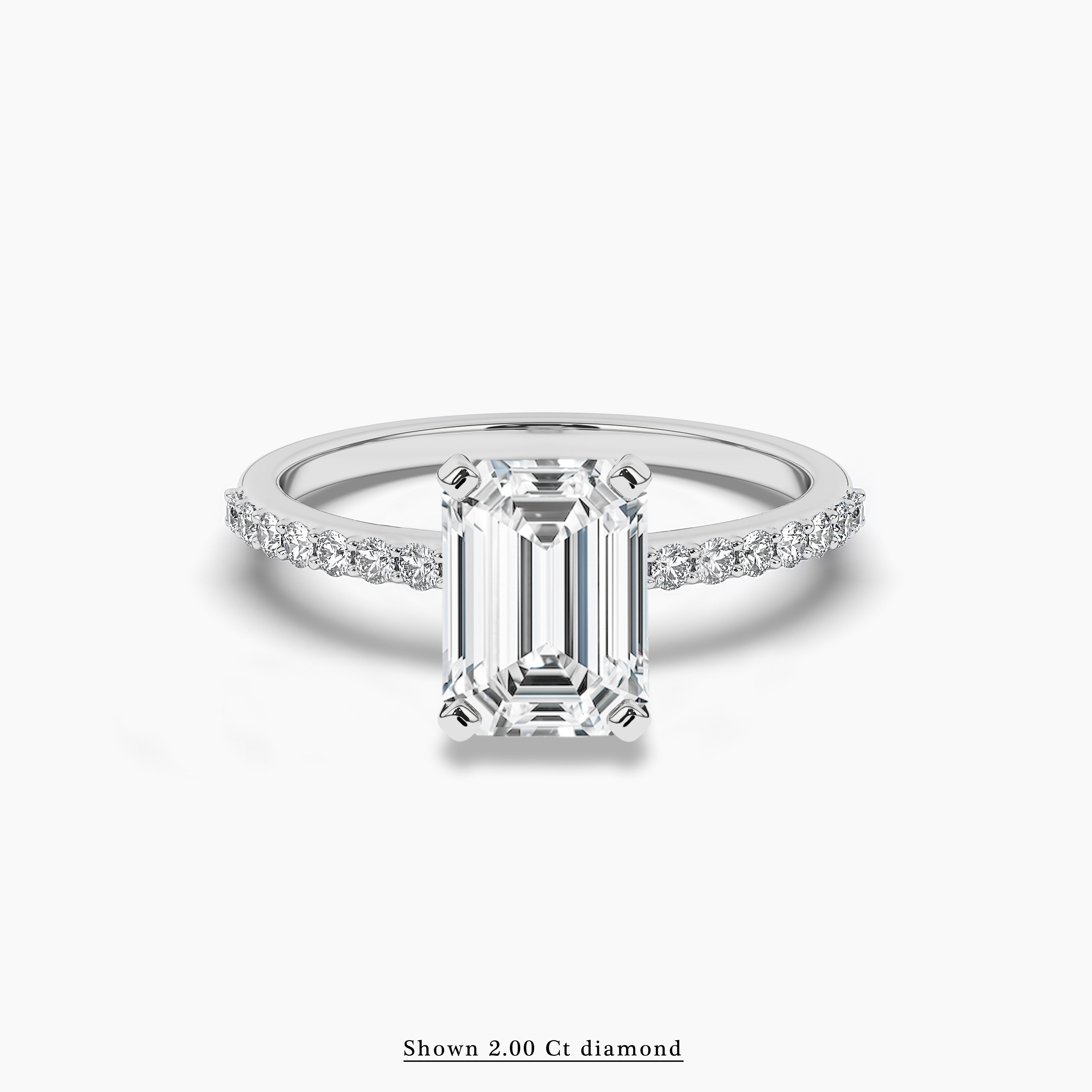Emerald Cut Solitaire Engagement Ring In White Gold 