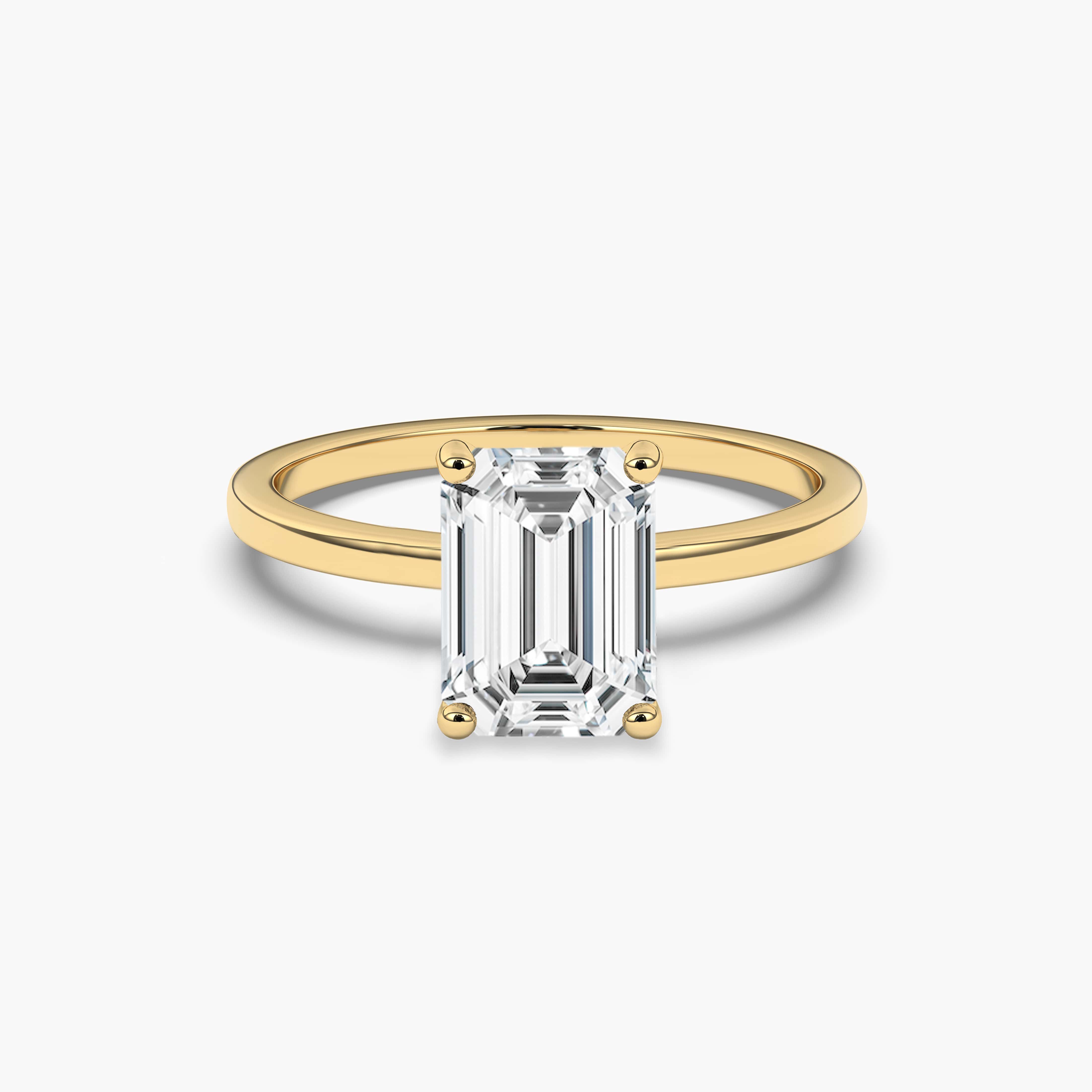 2.00carat gold emerald cut engagement ring