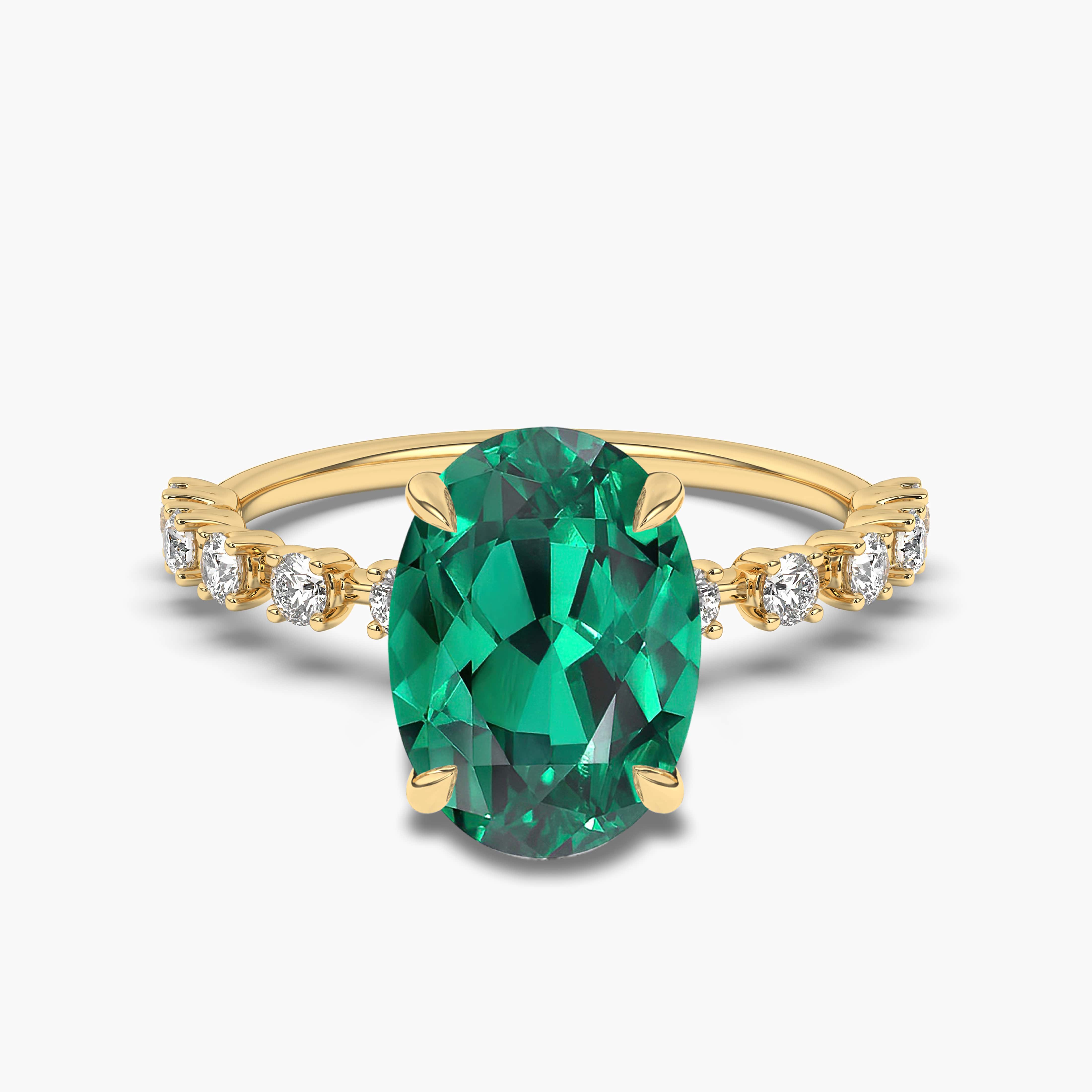 Women's Golden Prong Set Oval Emerald Diamond Ring