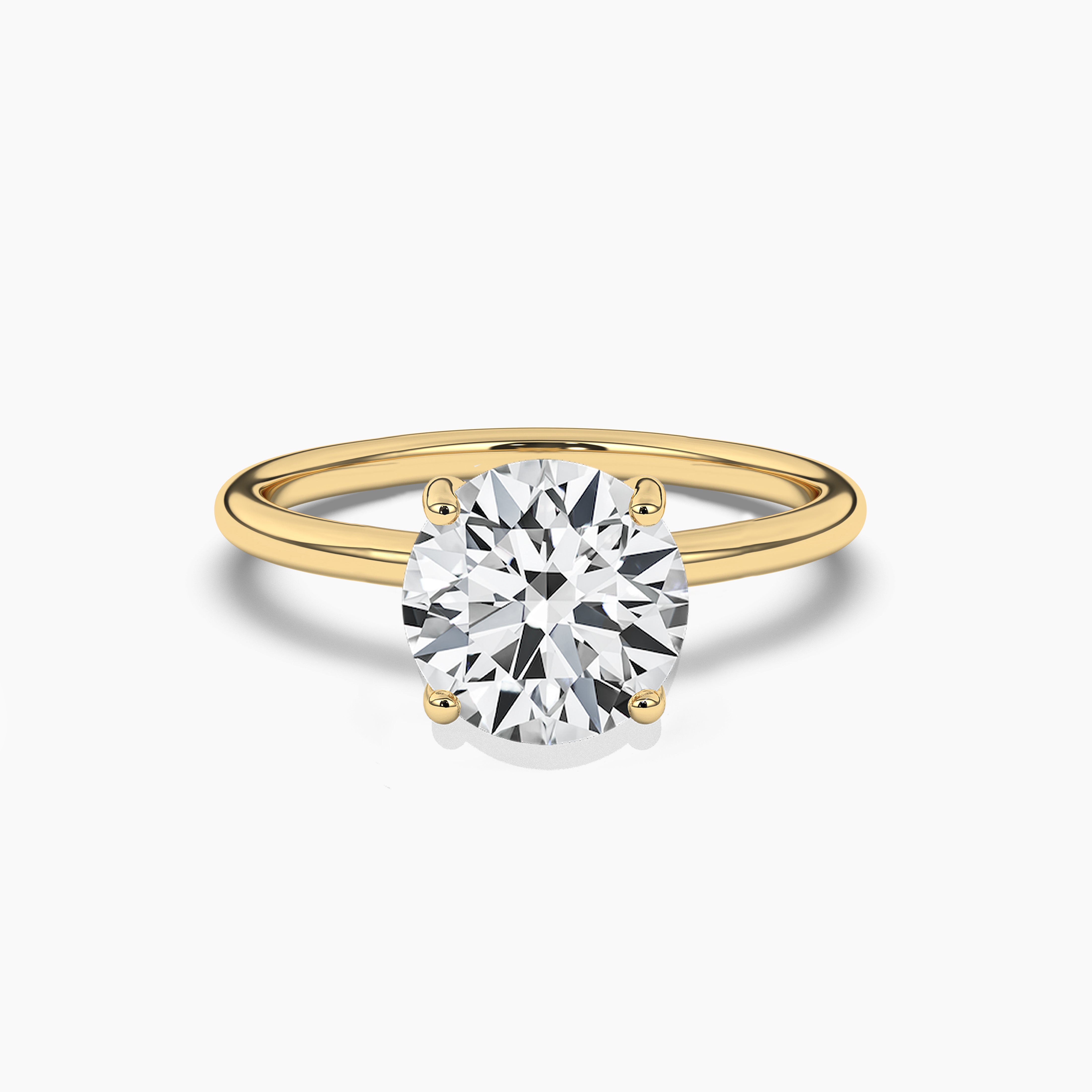 Round Shaped Solitaire Engagement Ring in Yellow Gold