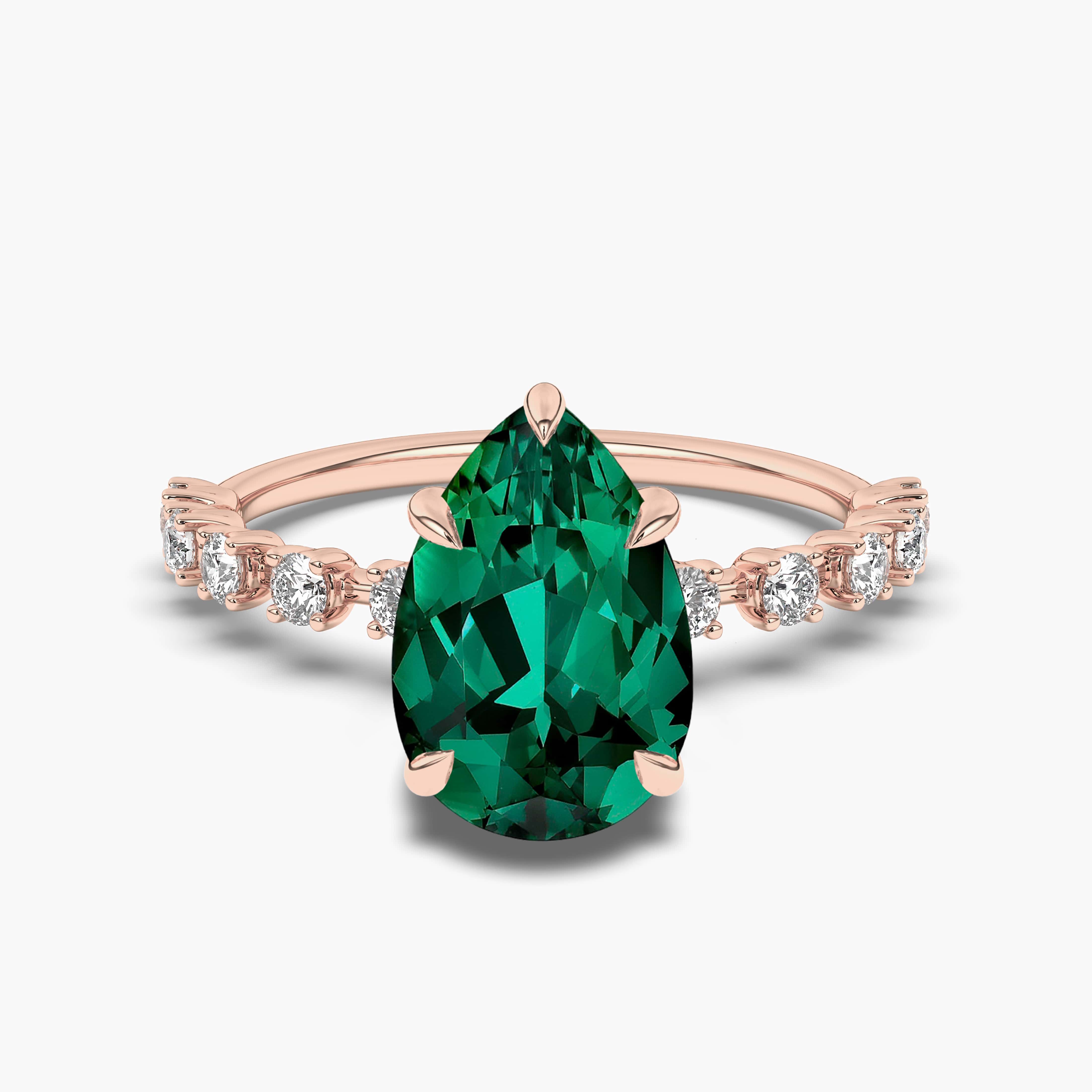 Rose Gold Pear Shaped Emerald And Diamond Engagement Ring
