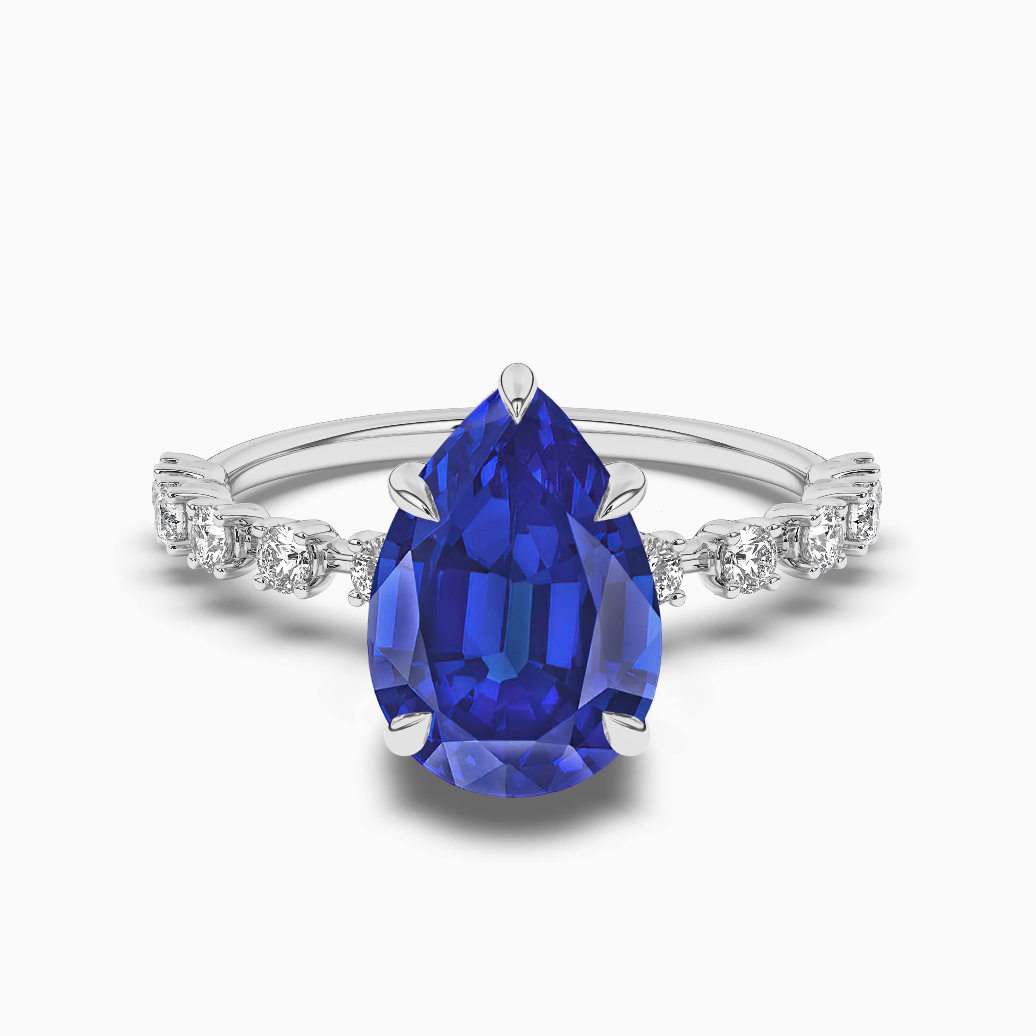 Blue sapphire and diamond pear vintage ring in white gold
