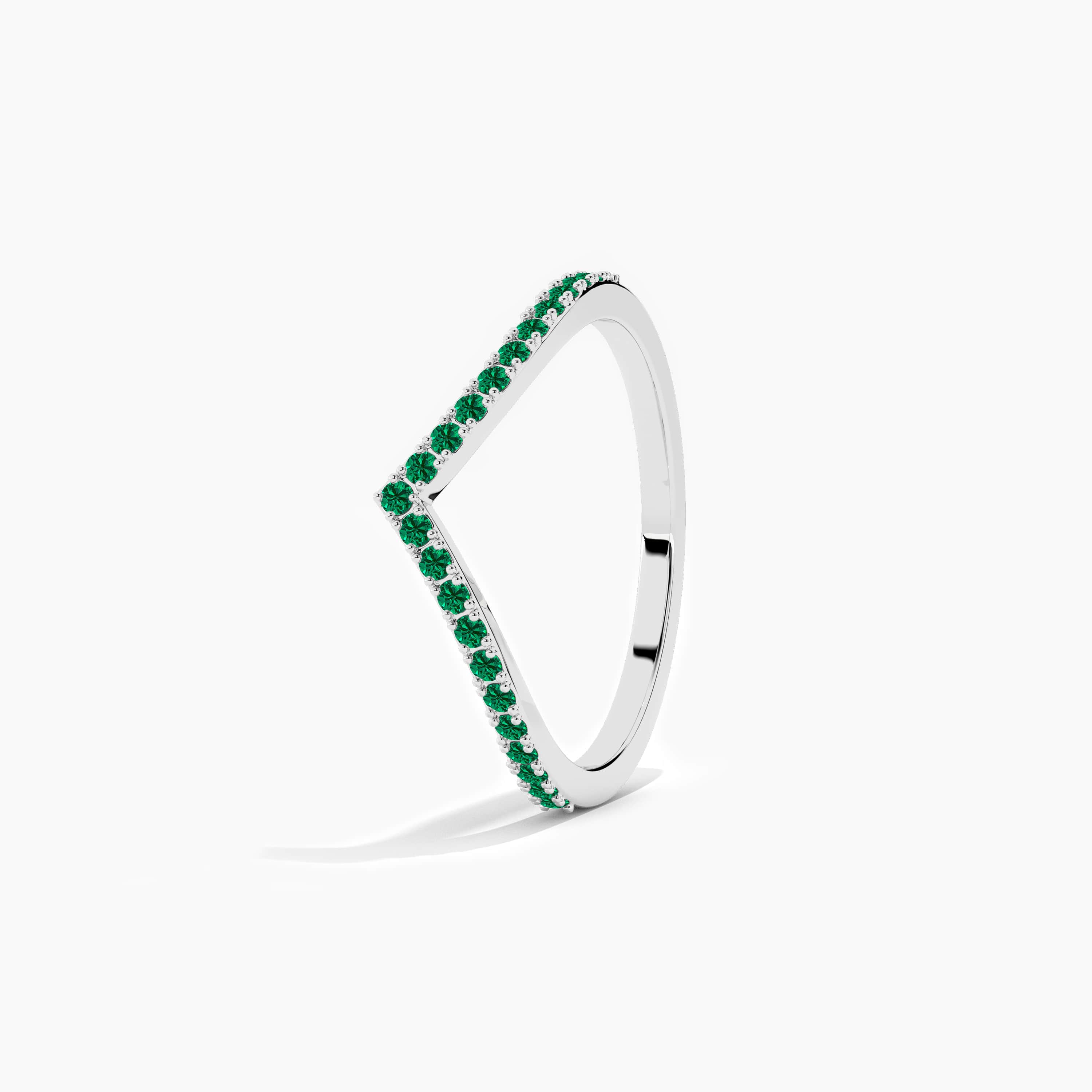 White gold curved ring in Emerald