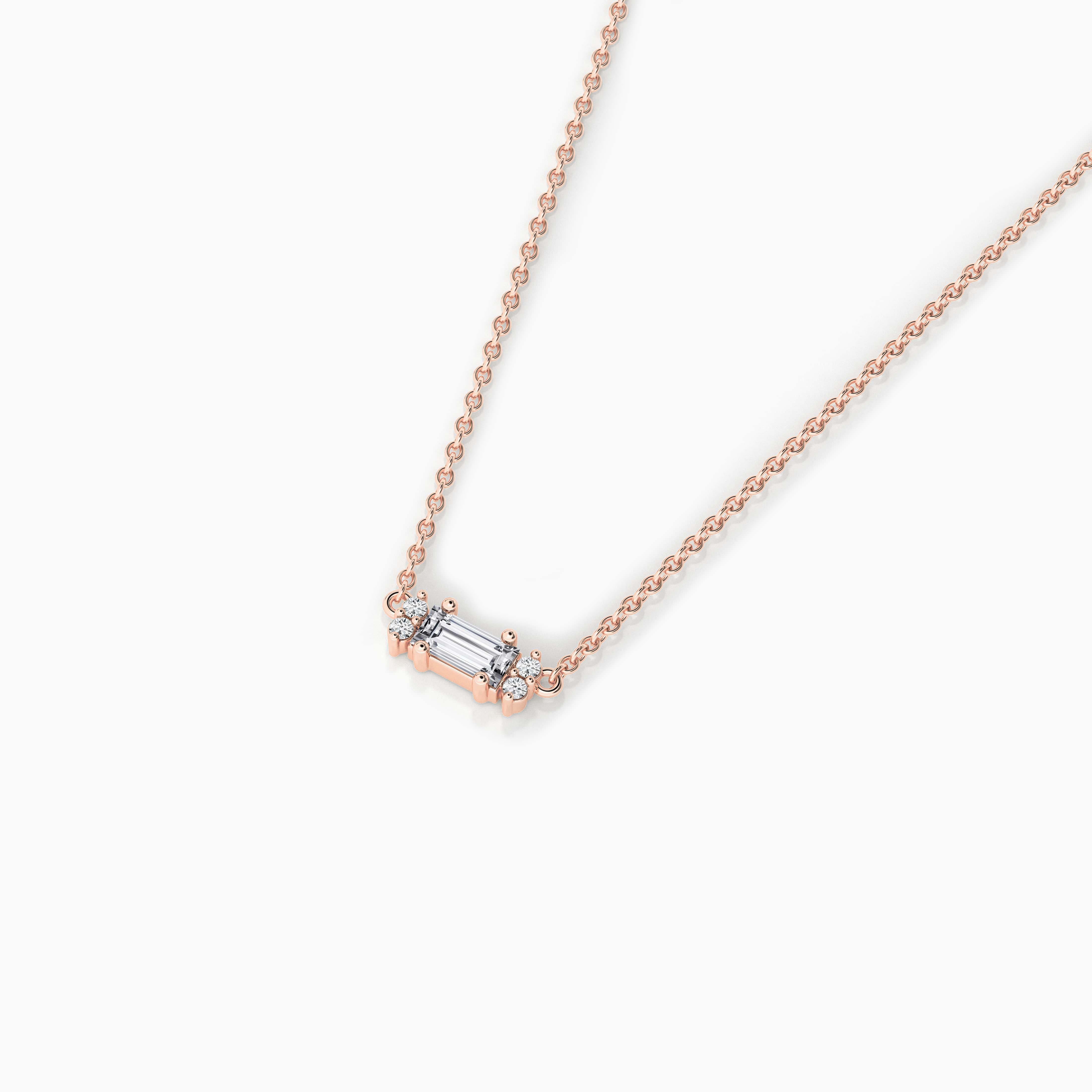Round and baguette shape diamond pendant necklace in rose gold
