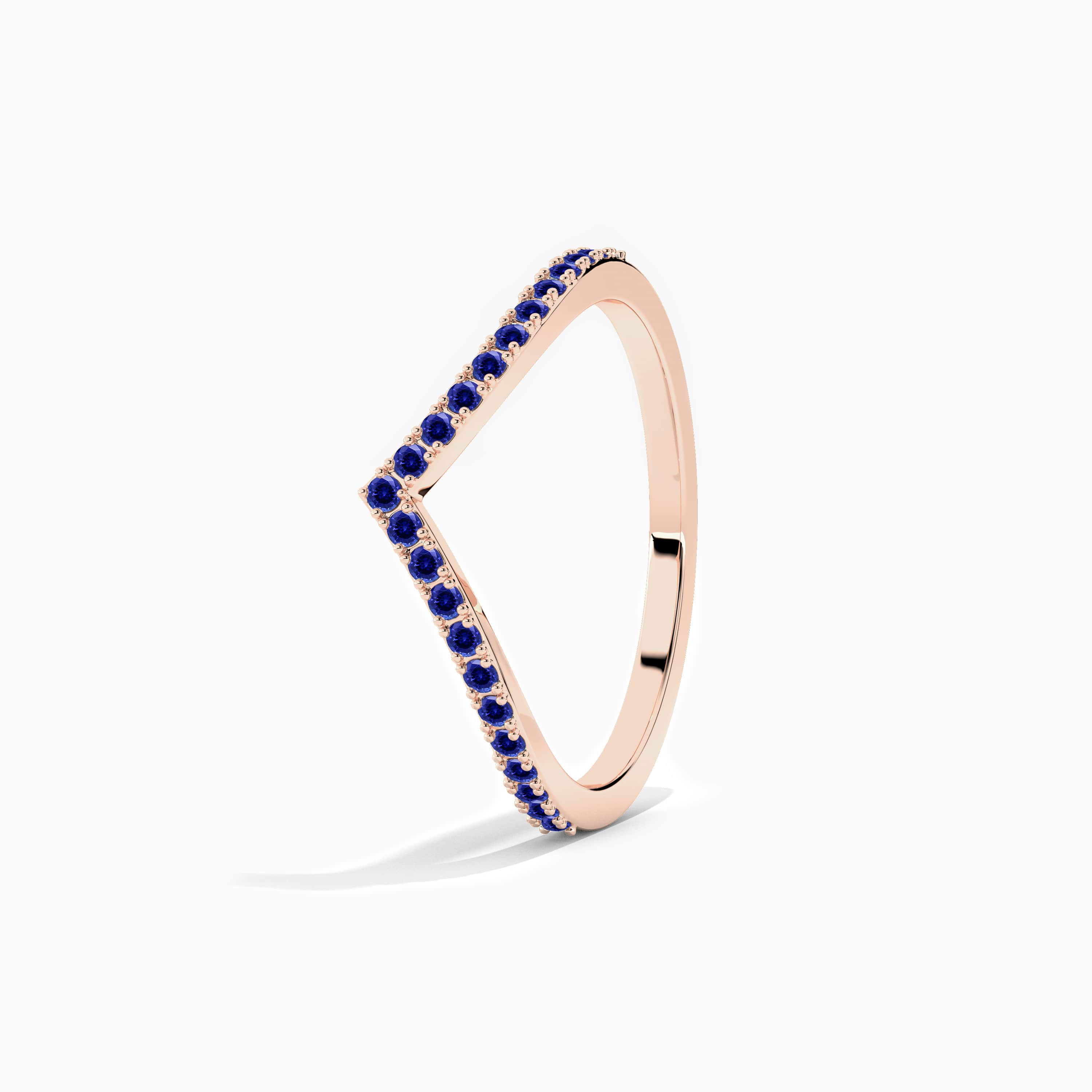 blue sapphire diamond curved ring in rose gold