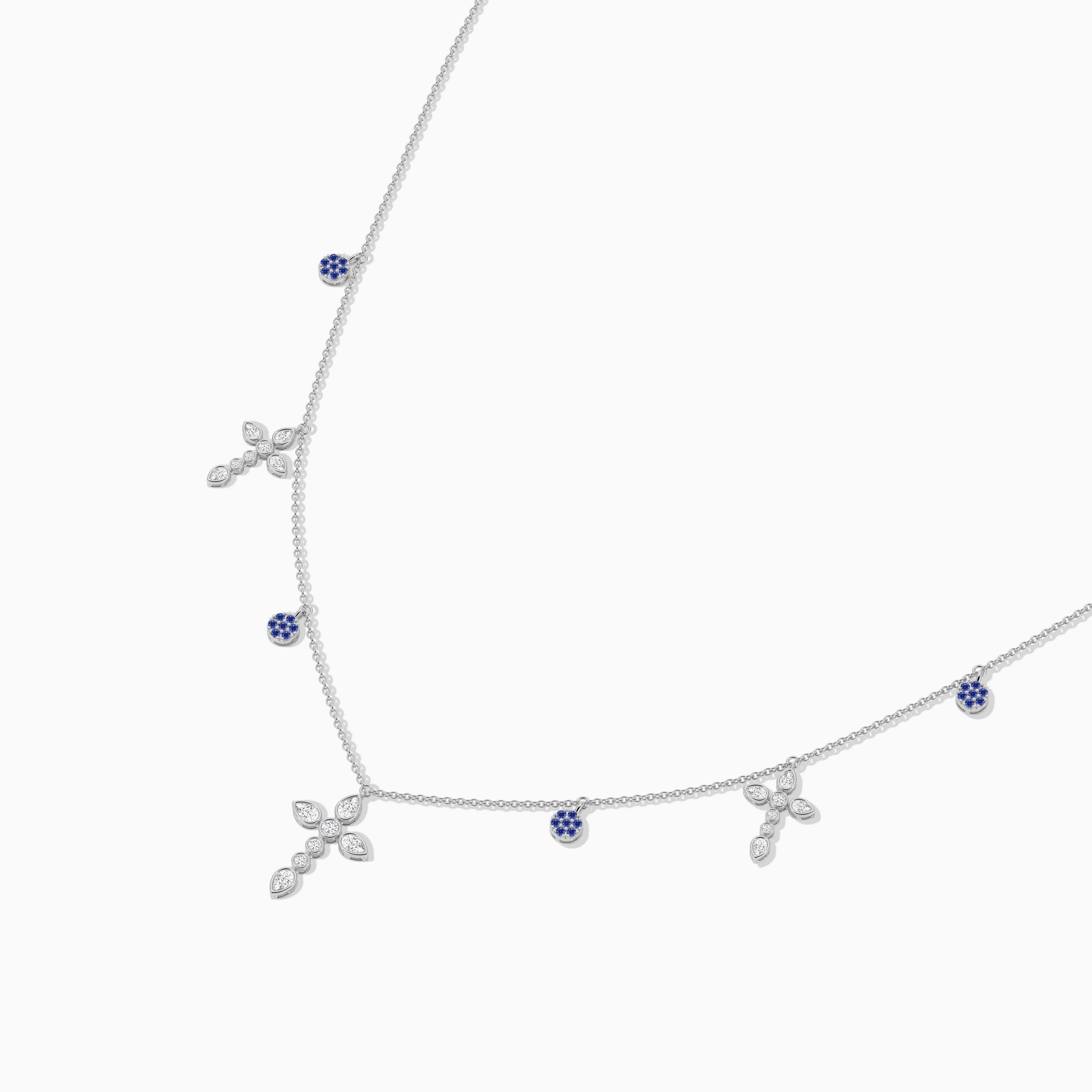 blue sapphire and diamond cross necklace