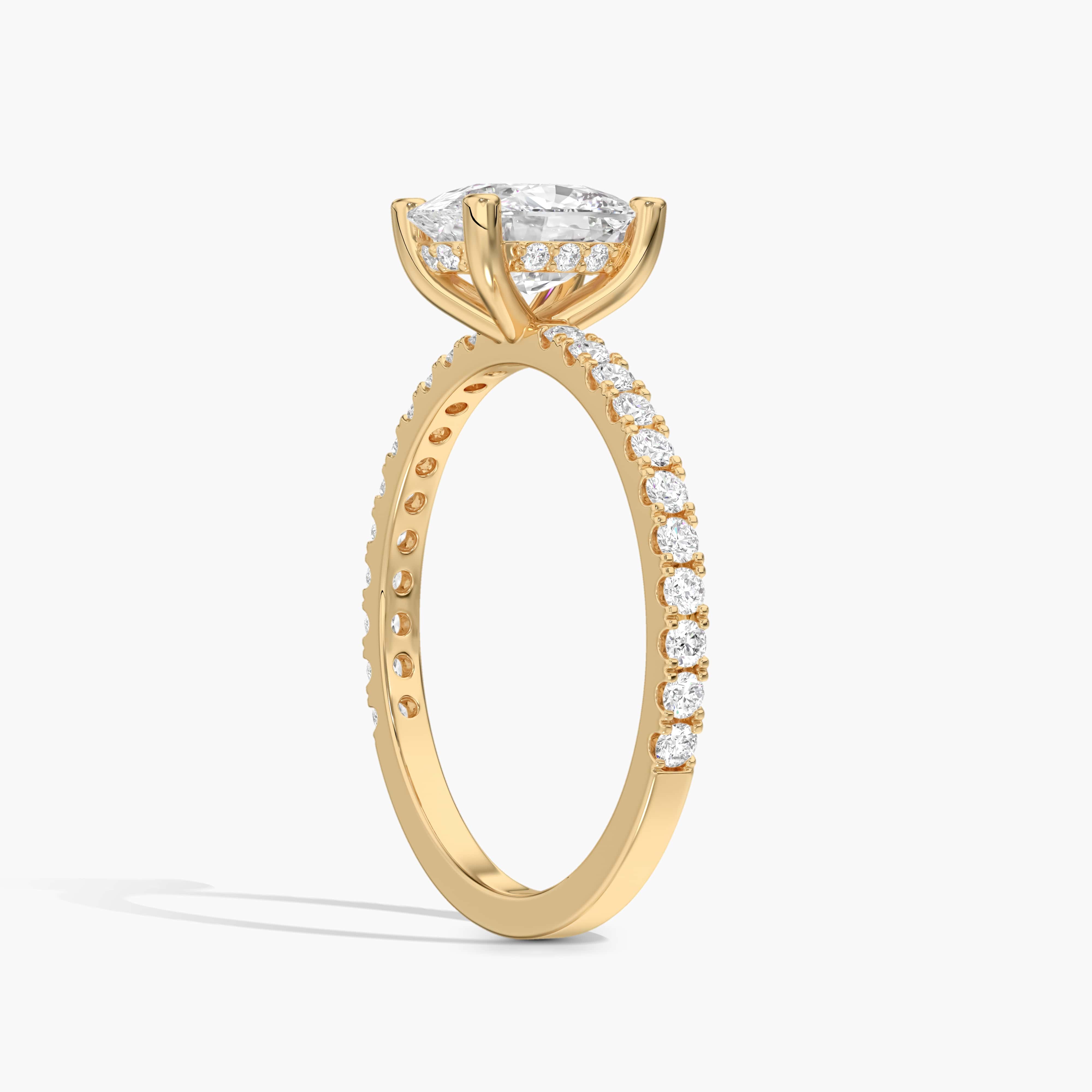 elongated cushion engagement ring yellow gold