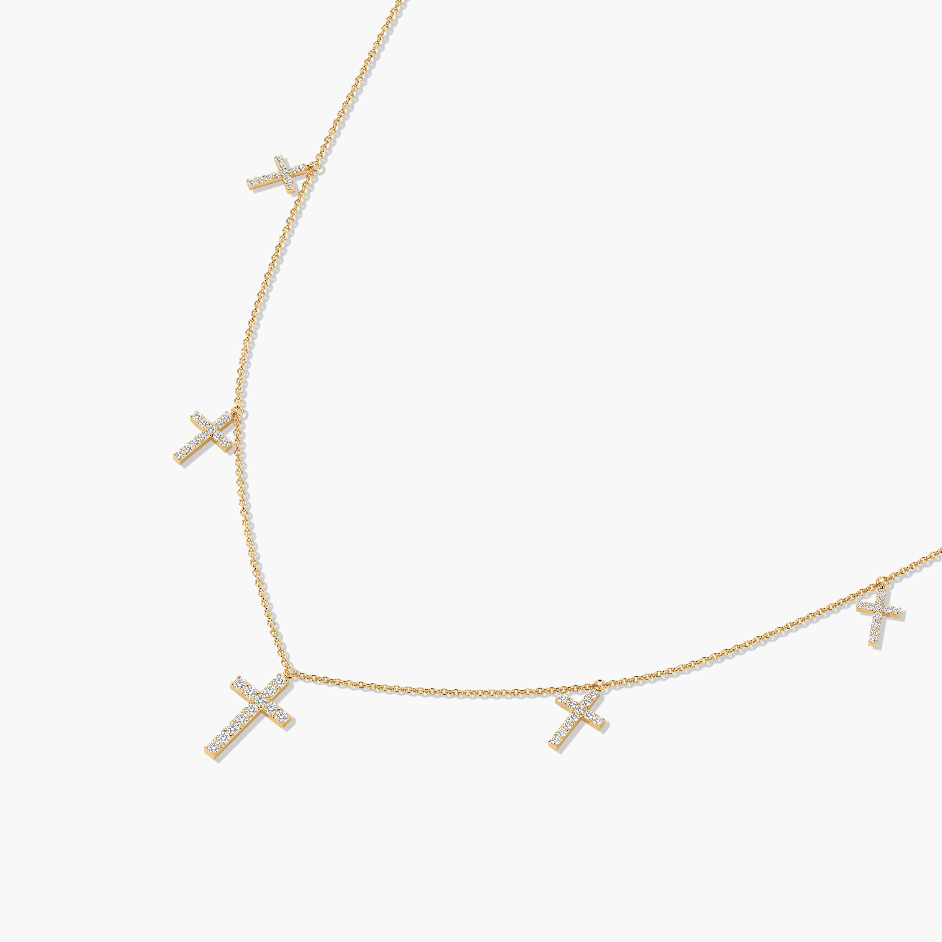 dangle cross necklace in yellow gold 