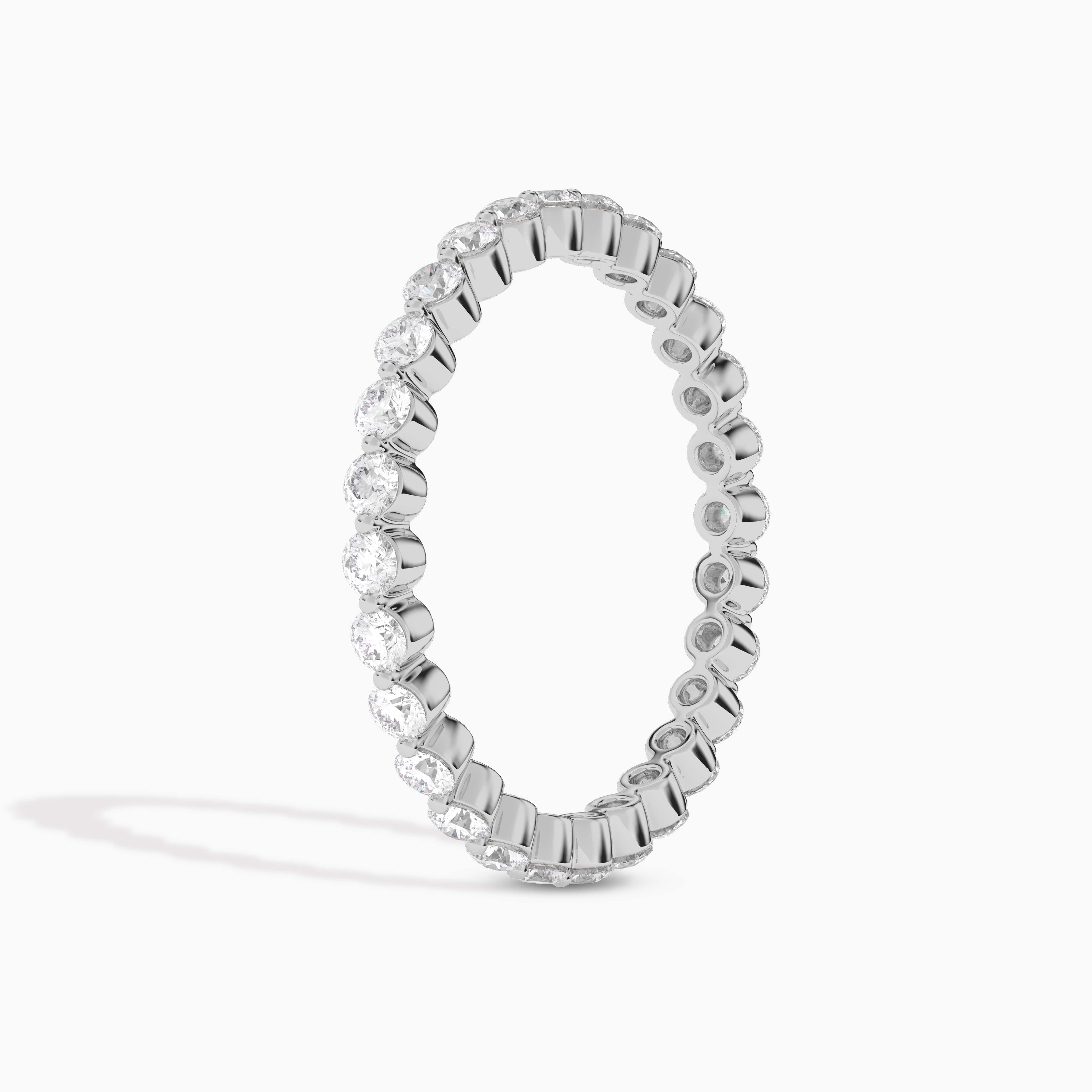 ROUND STONE MOISSANITE ETERNITY BAND IN WHITE GOLD