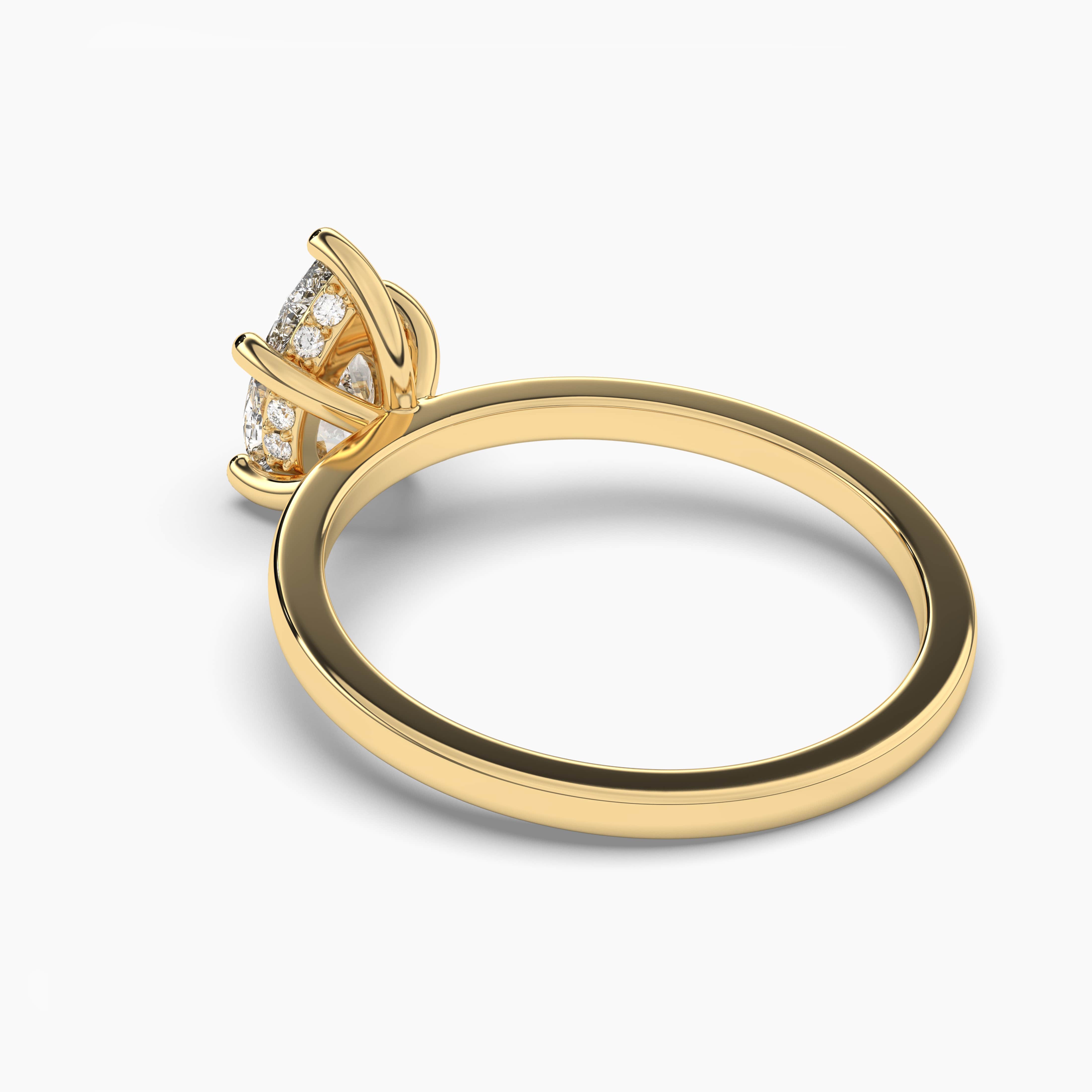 pear cut engagement ring in yellow gold