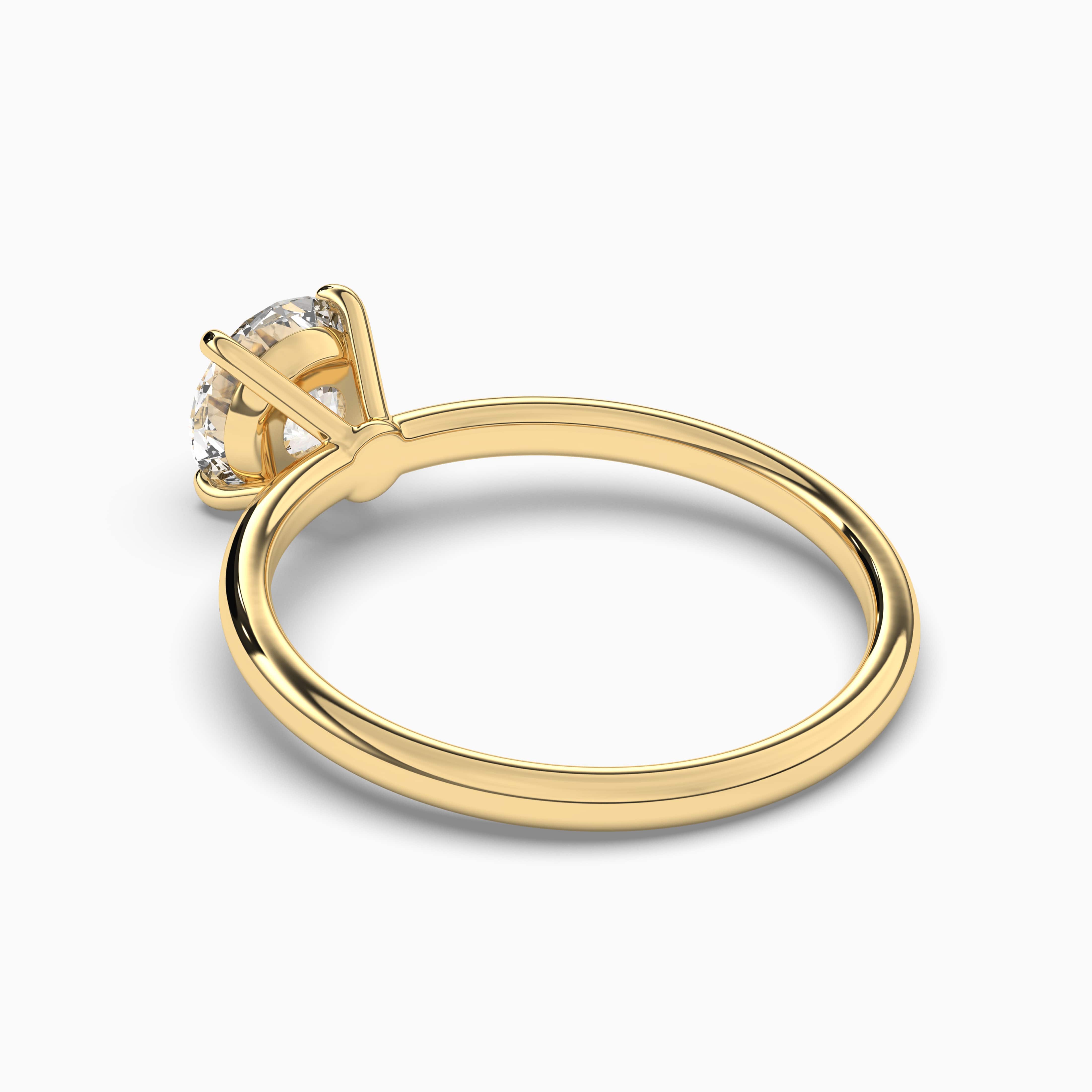 Yellow gold solitaire diamond ring