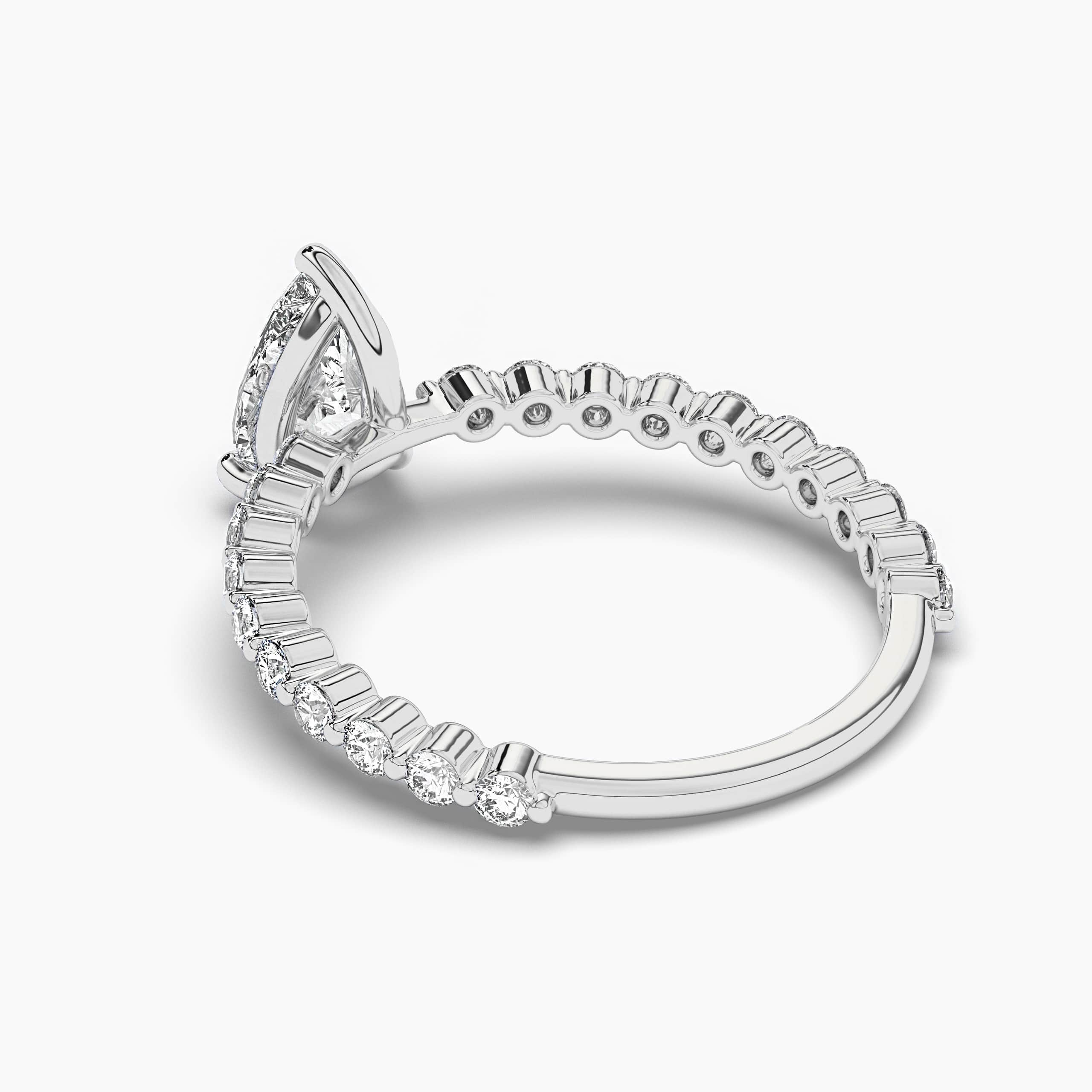 Pear Shaped diamond Side Stone Engagement Rings White Gold