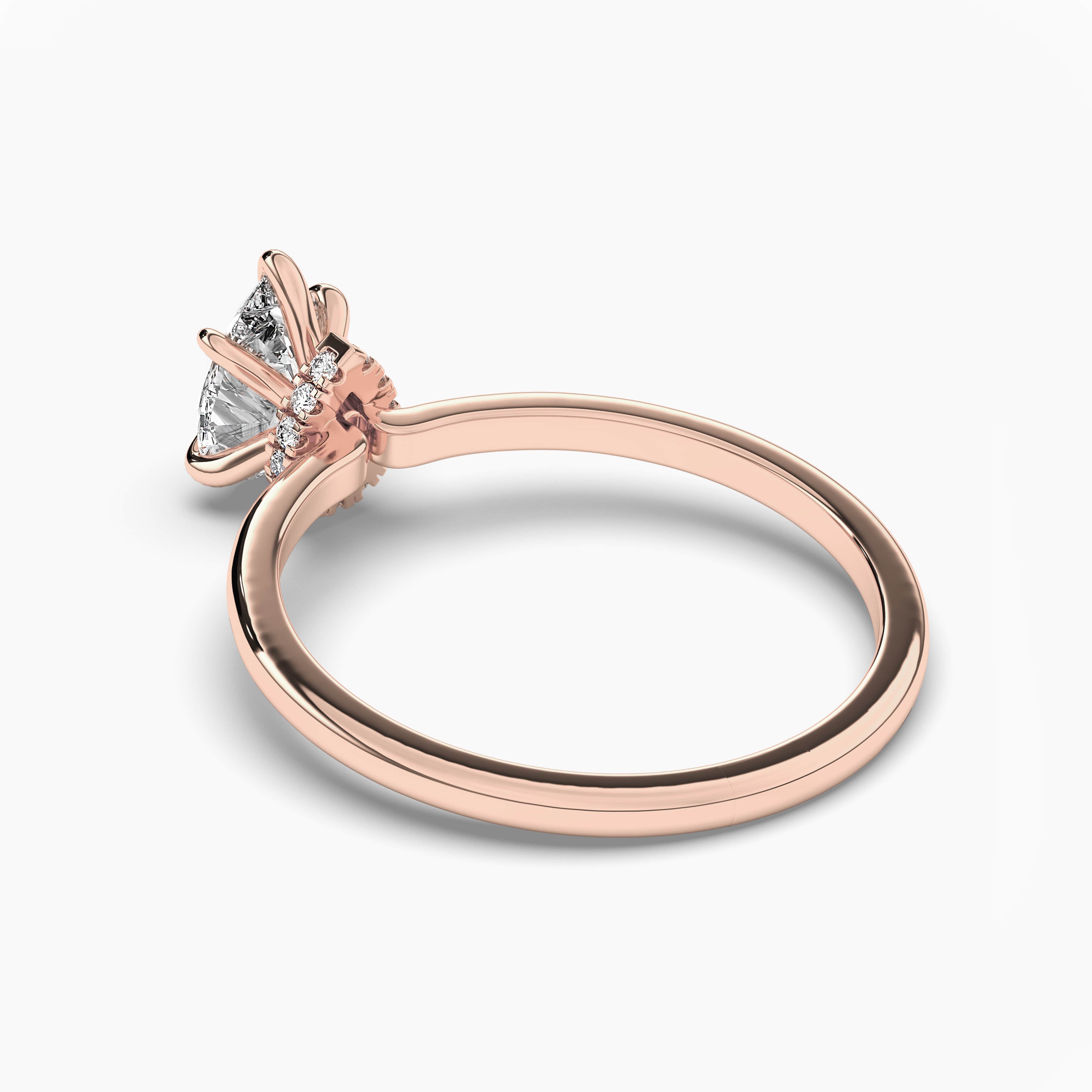 rose gold pear cut diamond engagement ring 