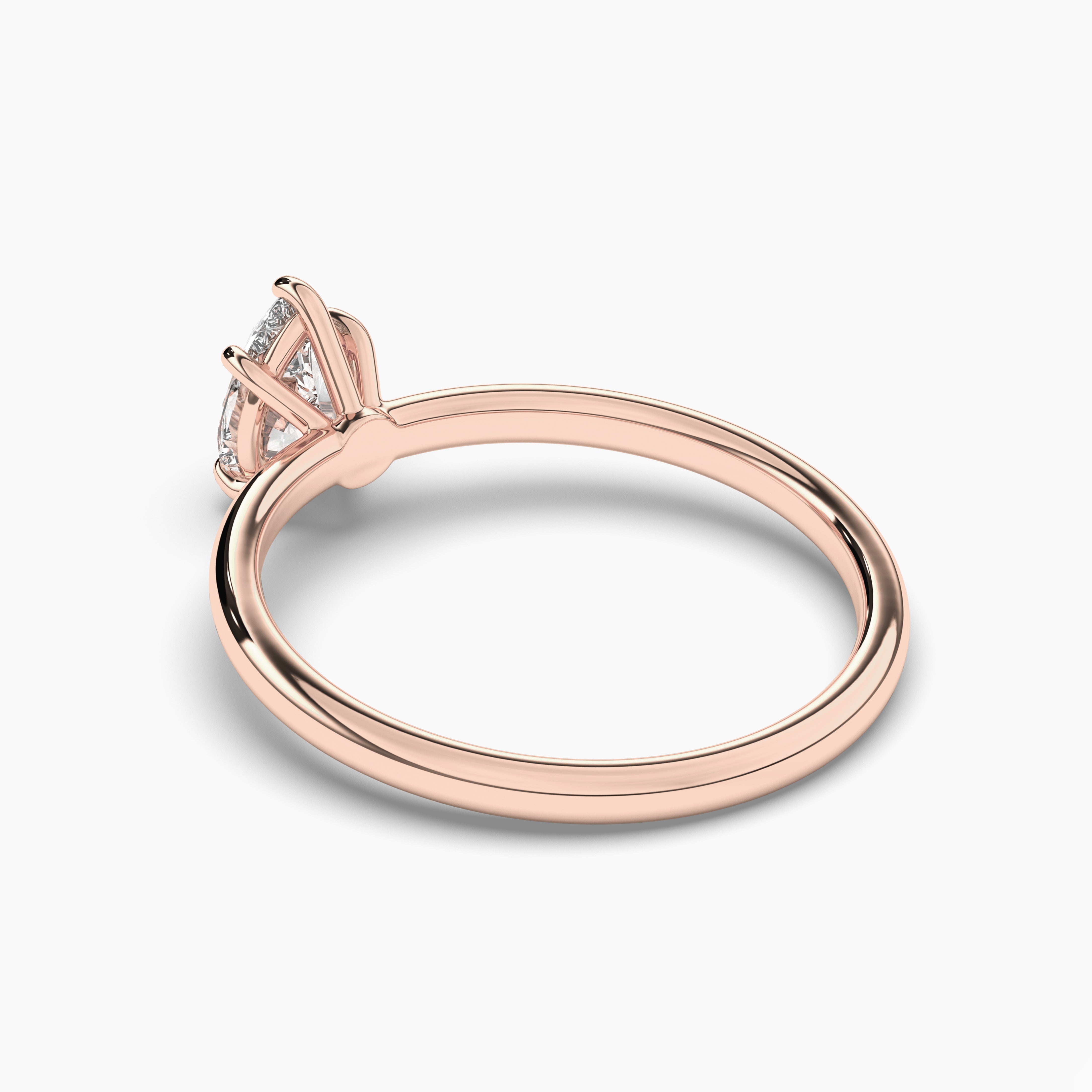 rose gold pear engagement rings
