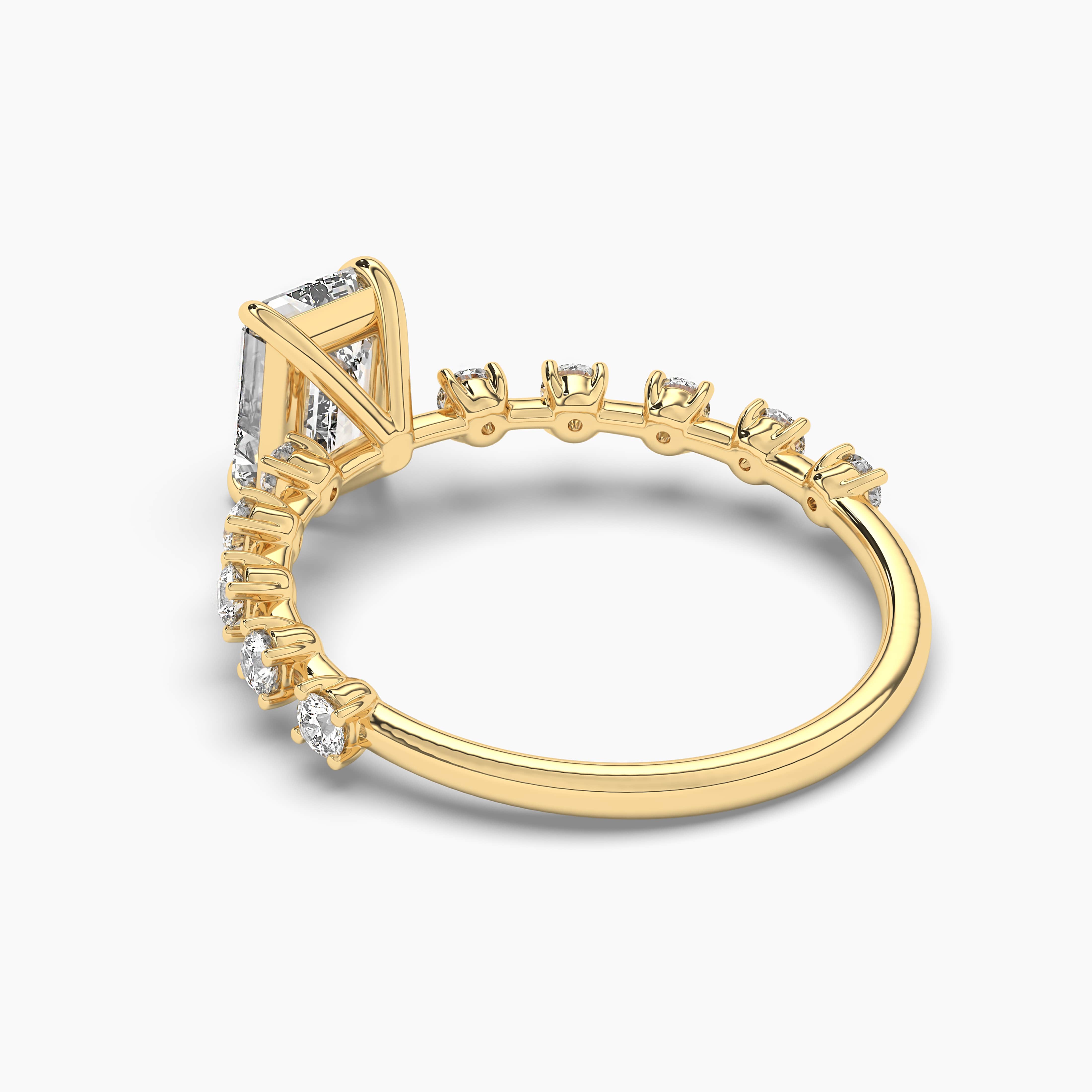 YELLOW GOLD SPLIT SHANK RING WITH EMERALD CUT SAPPHIRE AND DIAMONDS