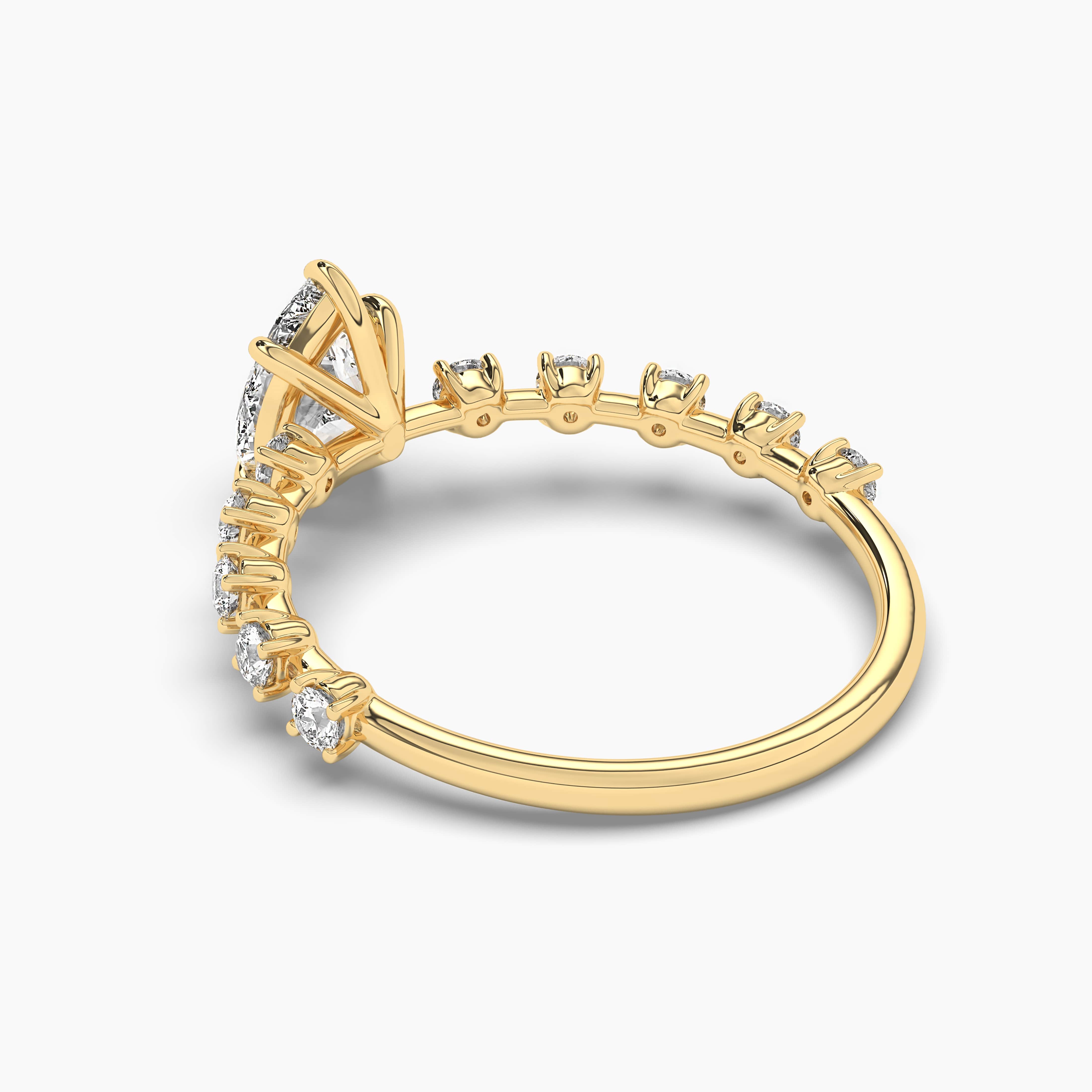 yellow gold pear cut moissanite diamond ring