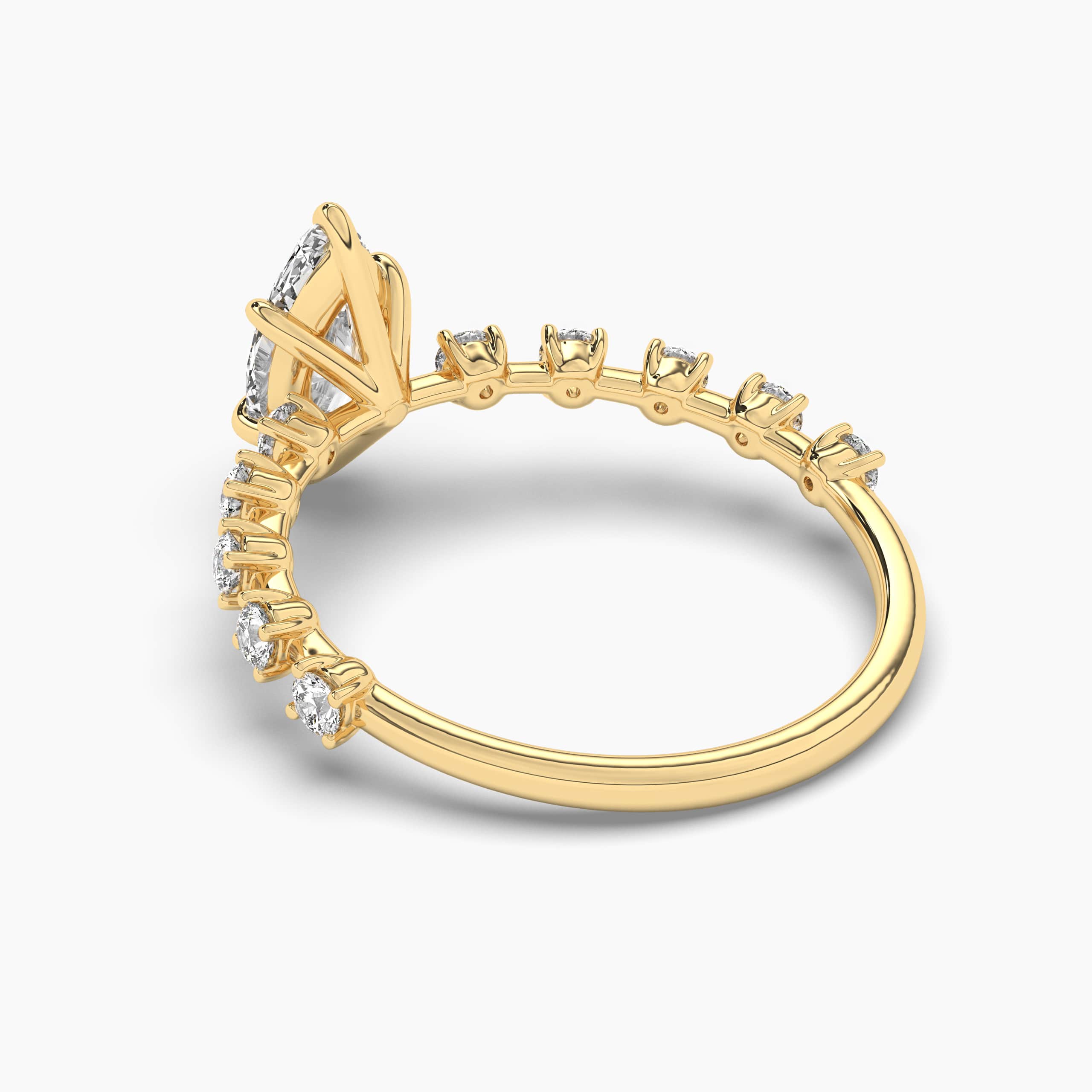 Yellow gold marquise diamond engagement ring