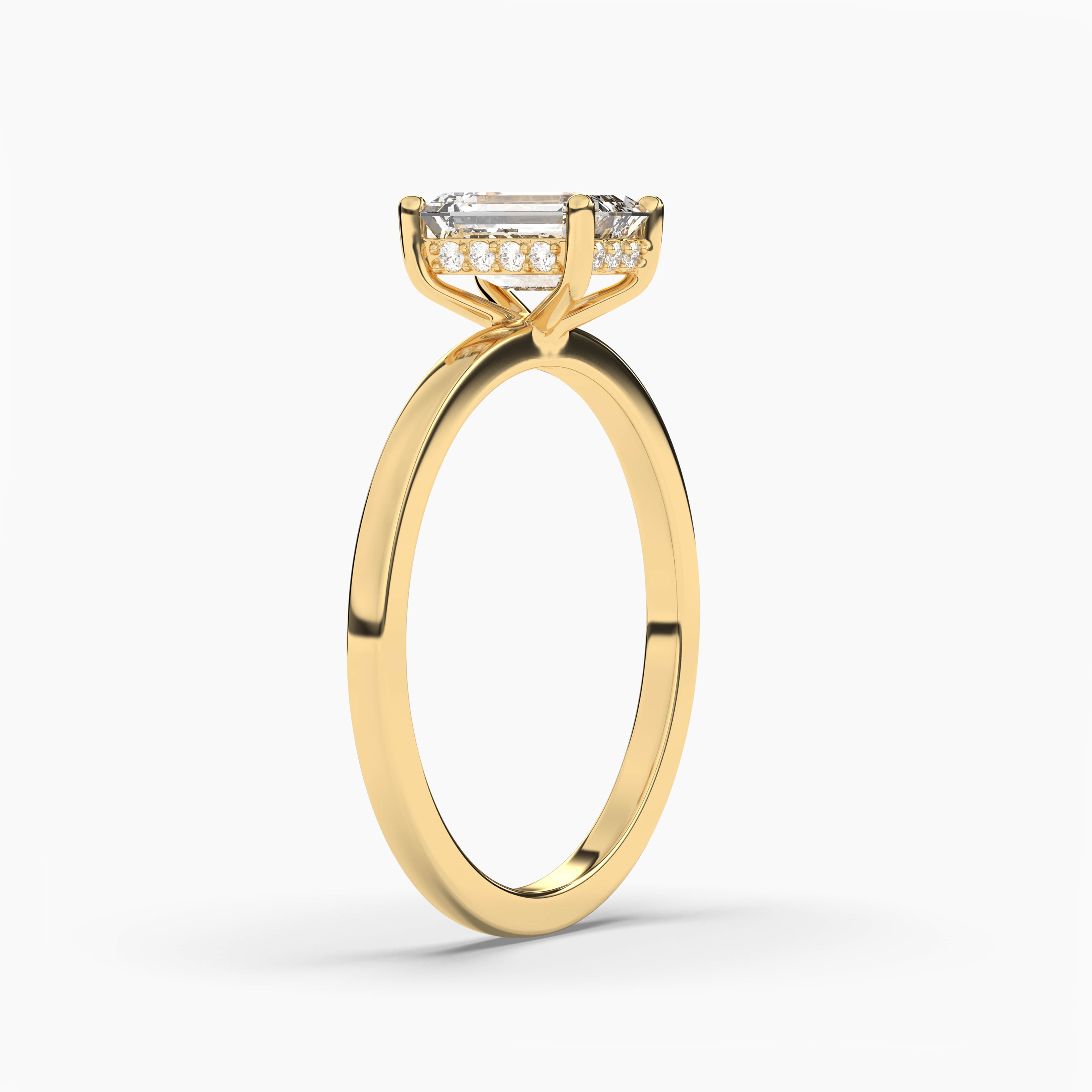 hidden halo emerald cut engagement ring