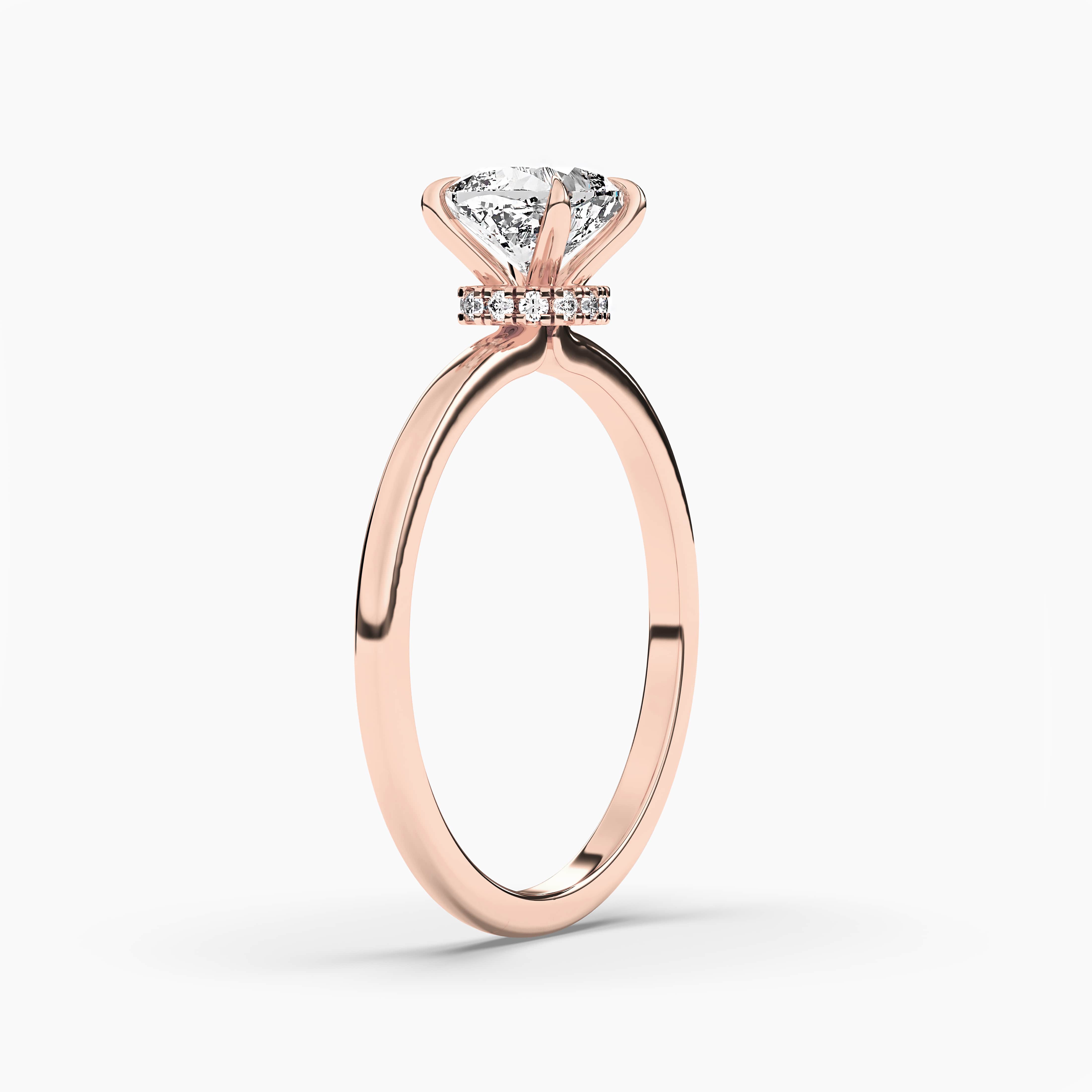 Rose gold hidden halo engagement ring