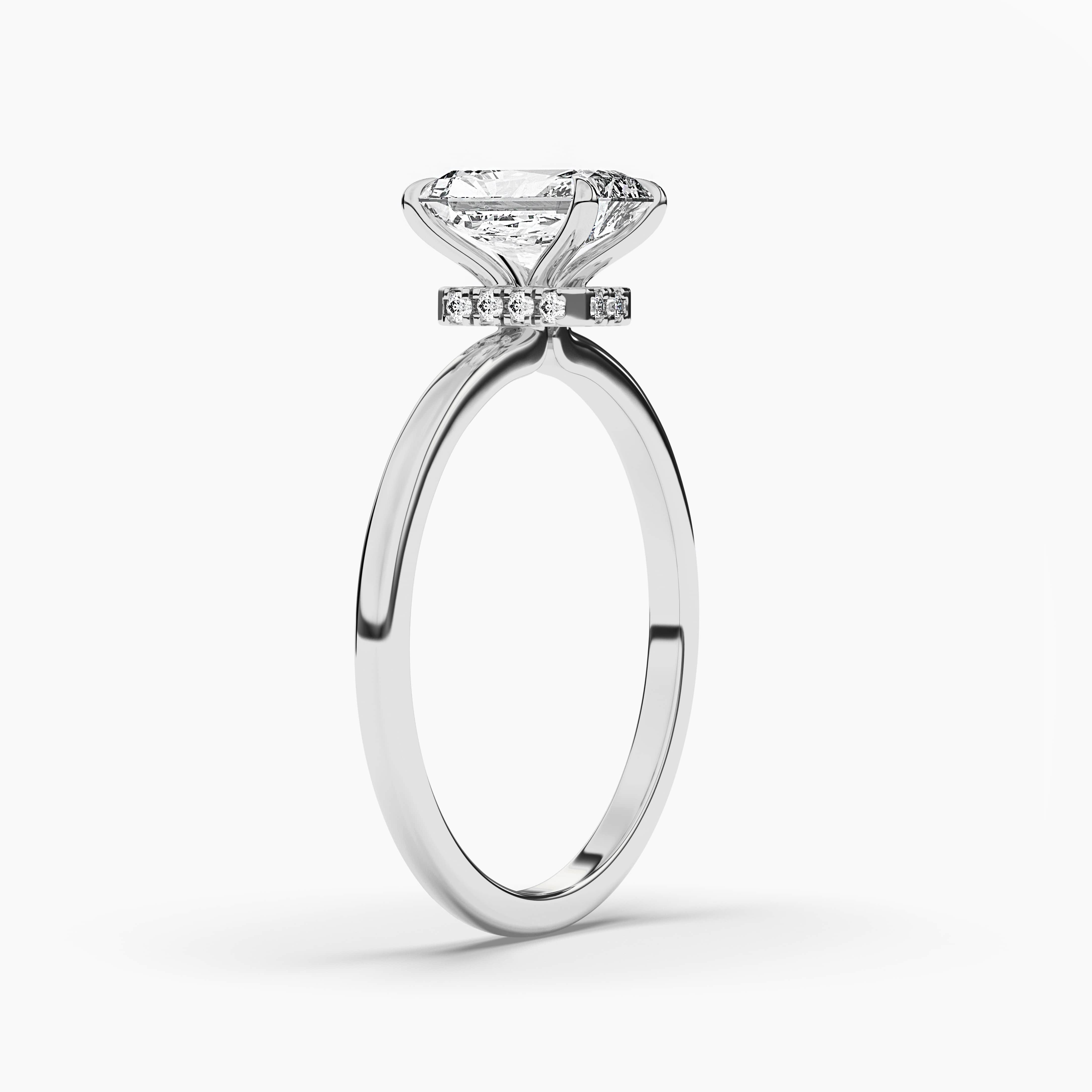 Radiant cut hidden halo ring